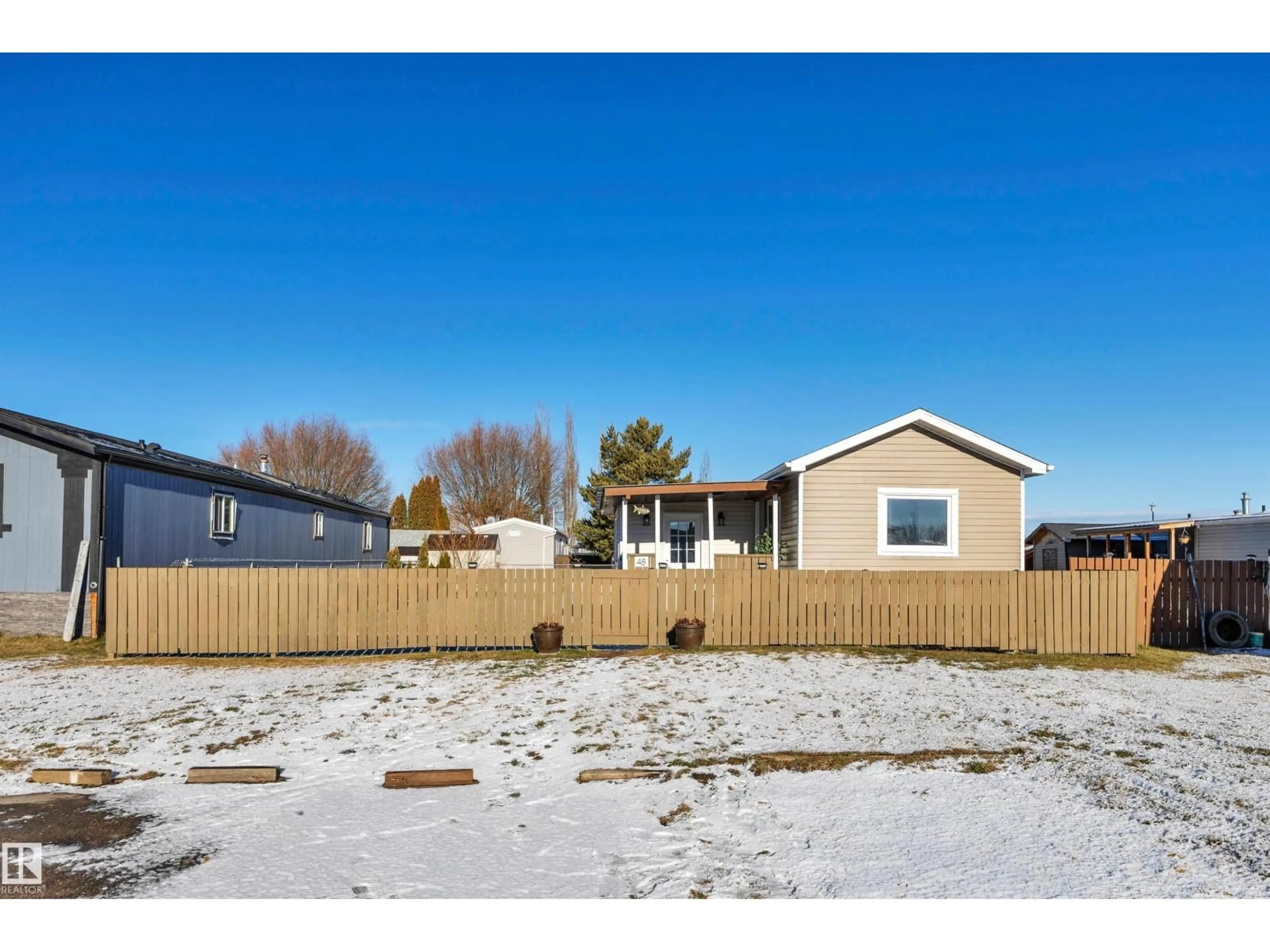 Home with vinyl exterior material, street for 48 CALMAR MOBILE HOME PARK, Calmar Alberta T0C0V0