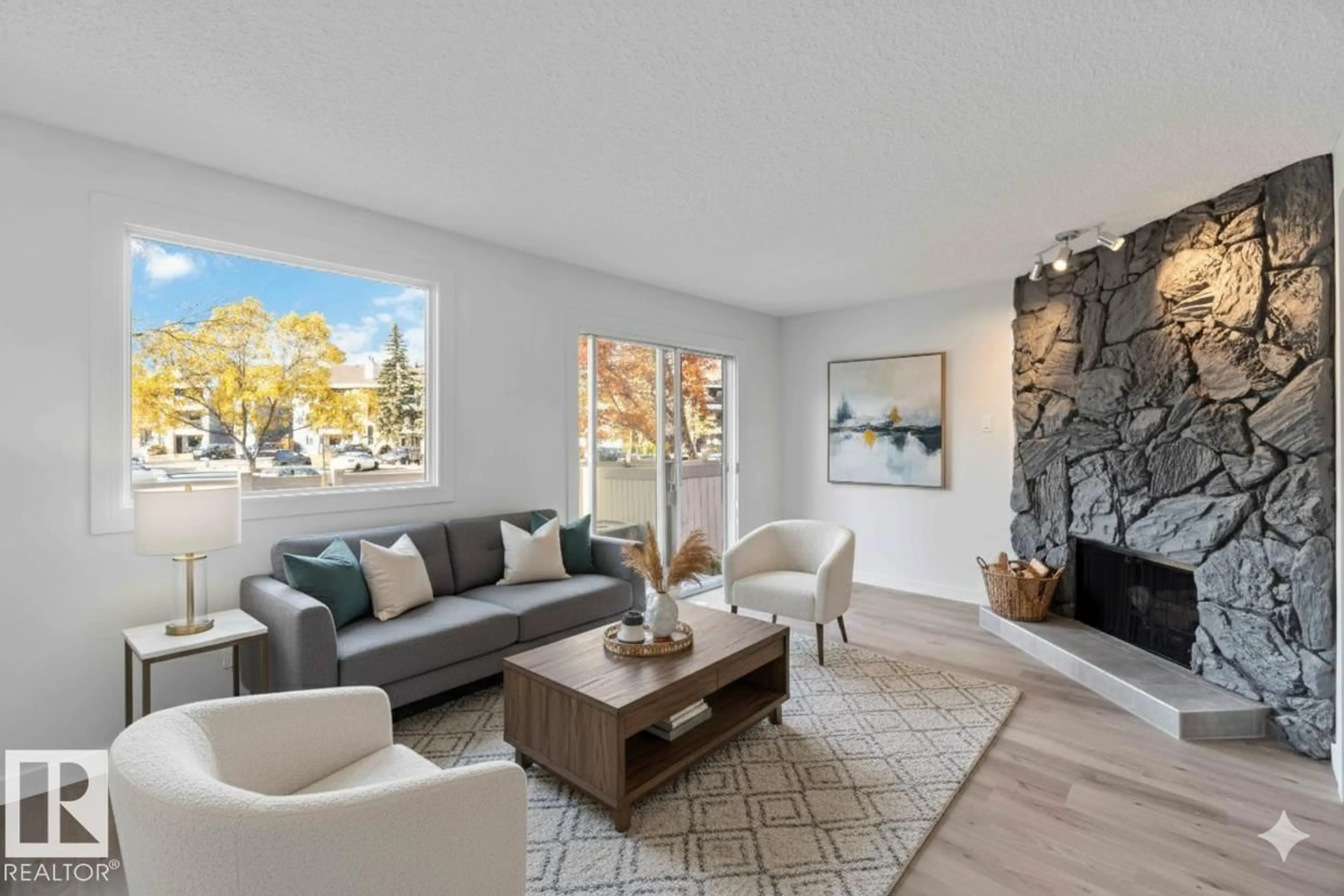 Living room with furniture, unknown for 1281 HOOKE RD, Edmonton Alberta T5A4A5