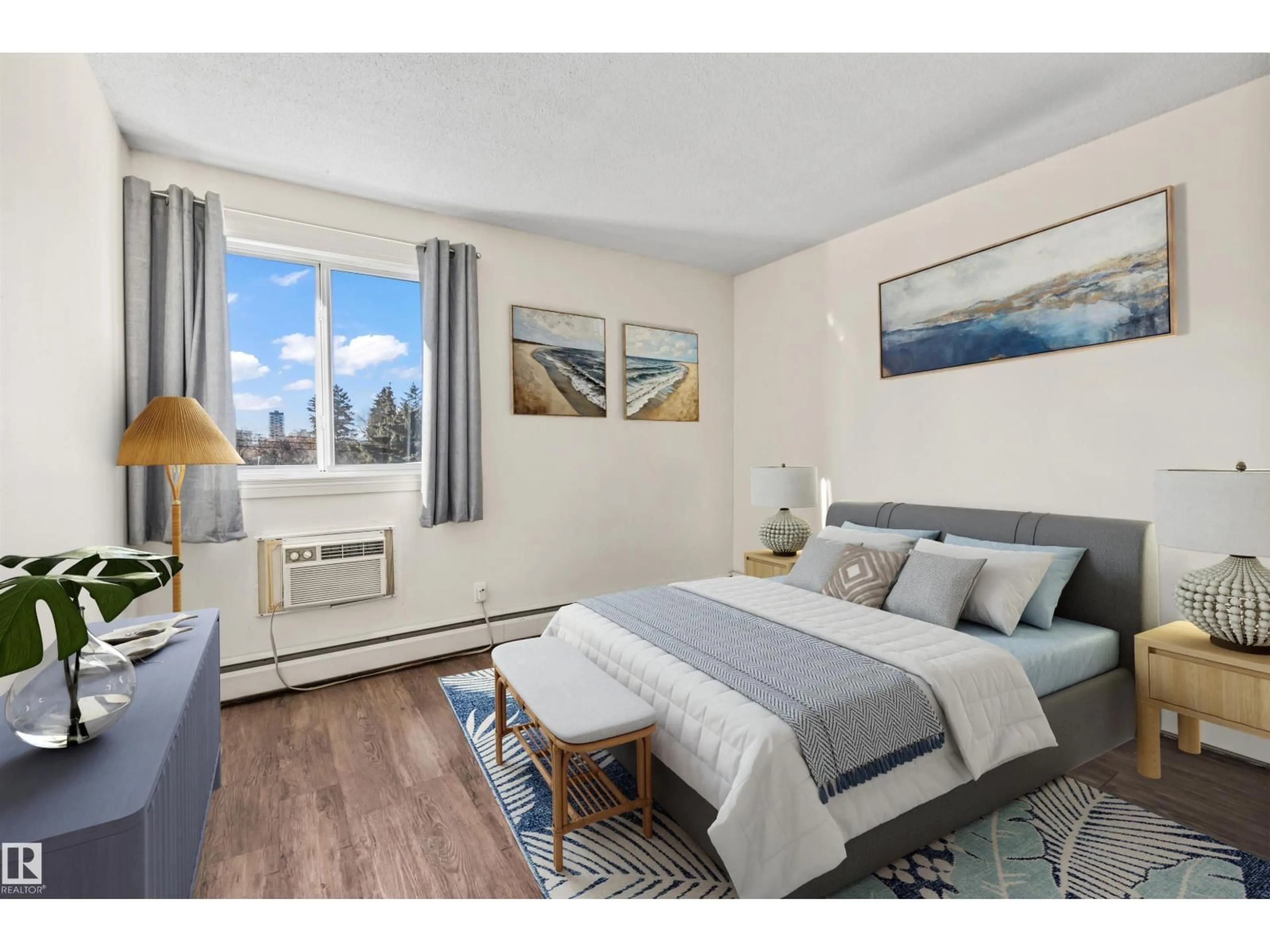 Bedroom with bed, wood/laminate floor for 8604 - 425 GATEWAY BV, Edmonton Alberta T6E4B6