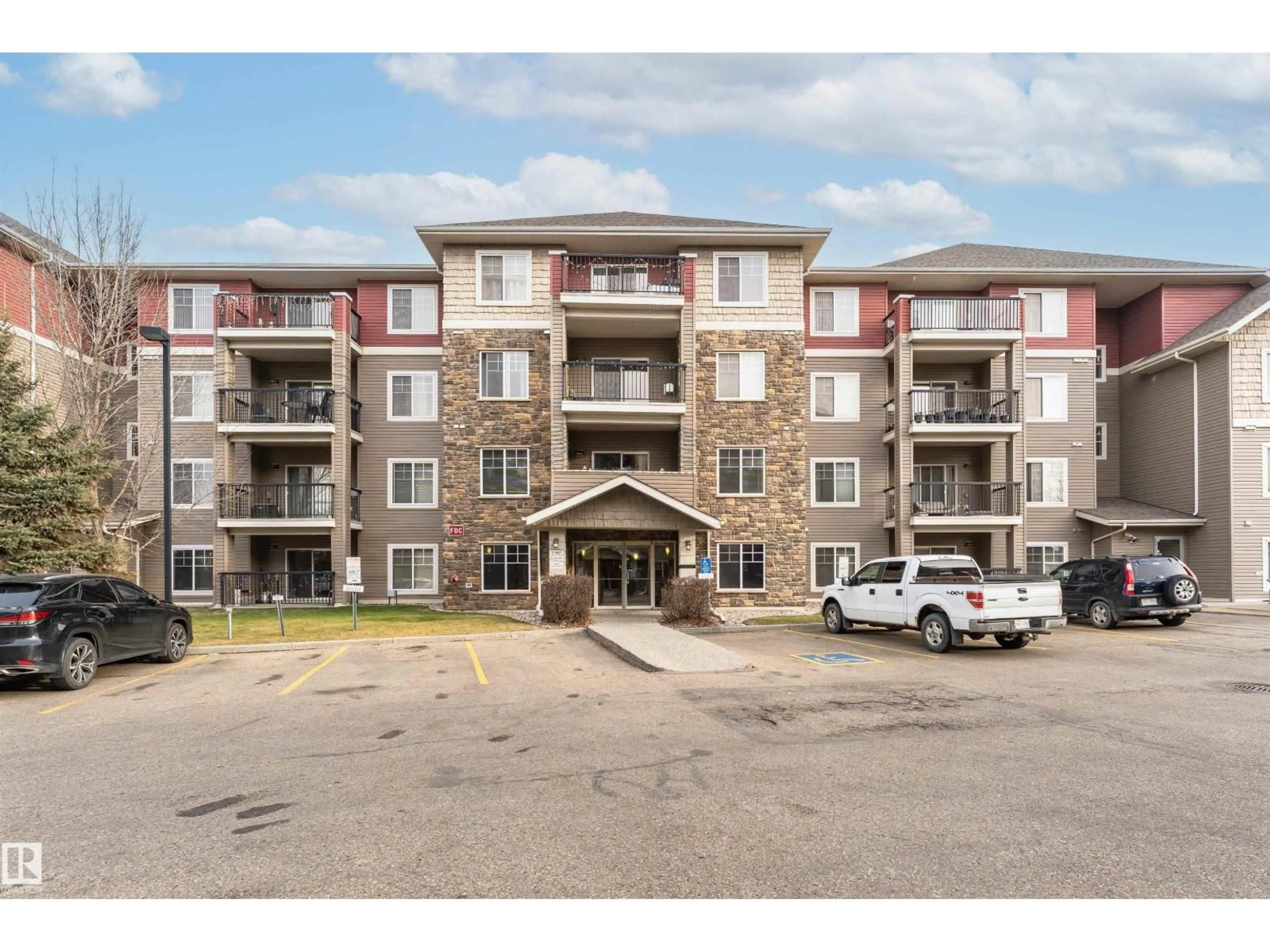 A pic from outside/outdoor area/front of a property/back of a property/a pic from drone, unknown for #302 - 17407 99 AV, Edmonton Alberta T5T0W7