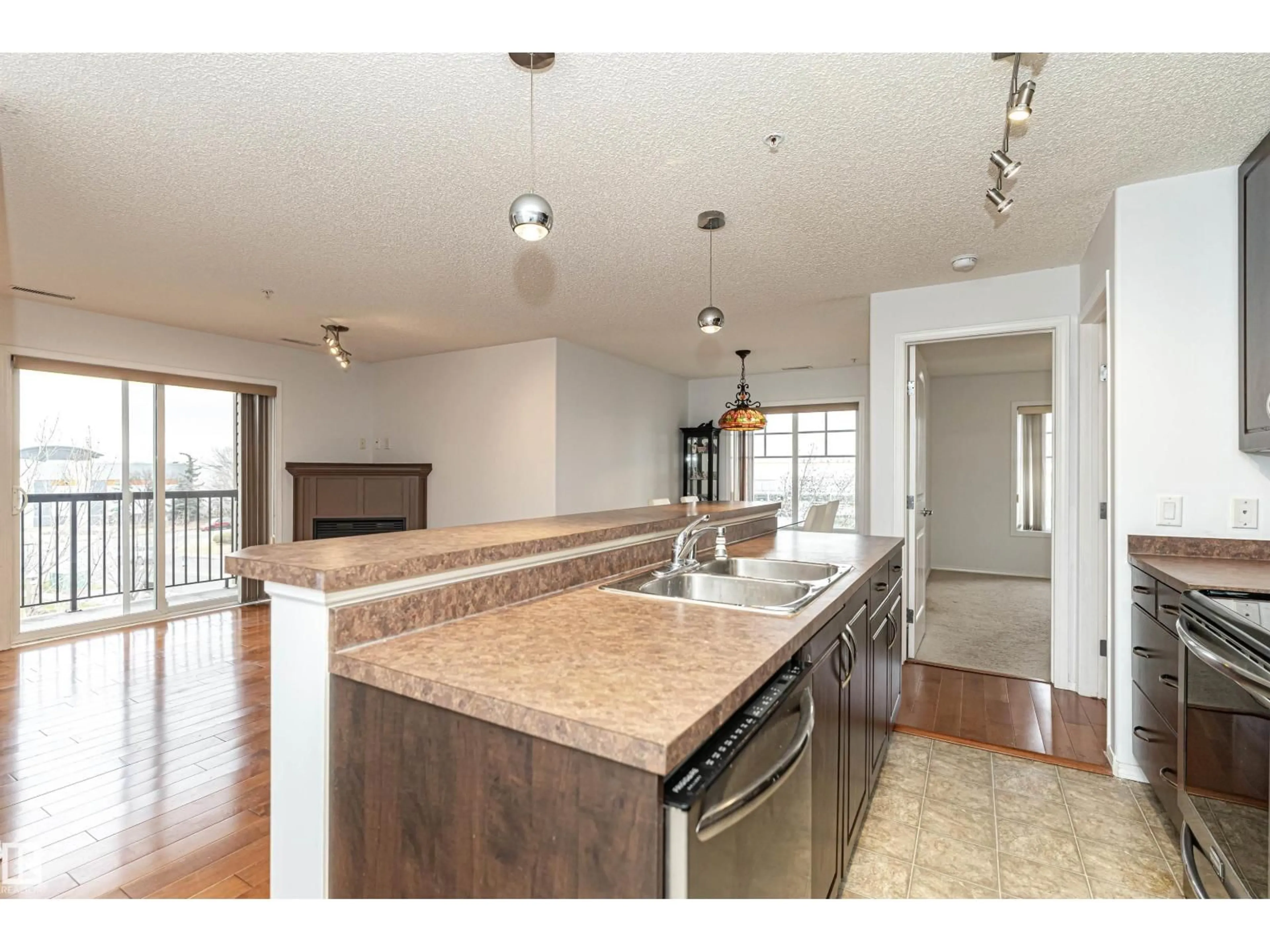 Open concept kitchen, unknown for #302 - 17407 99 AV, Edmonton Alberta T5T0W7
