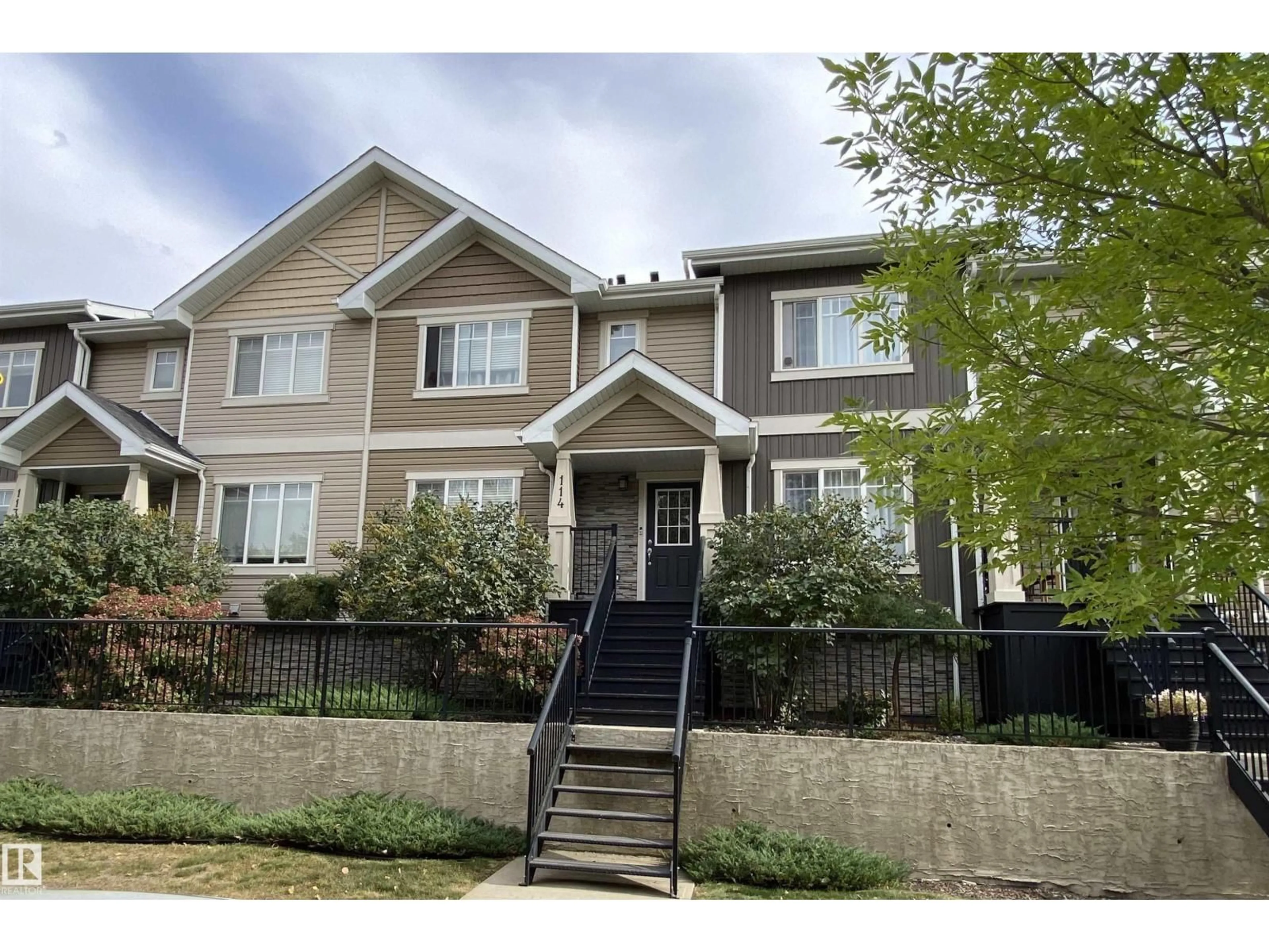 Home with vinyl exterior material, street for #114 - 9535 217 ST, Edmonton Alberta T5T4P5