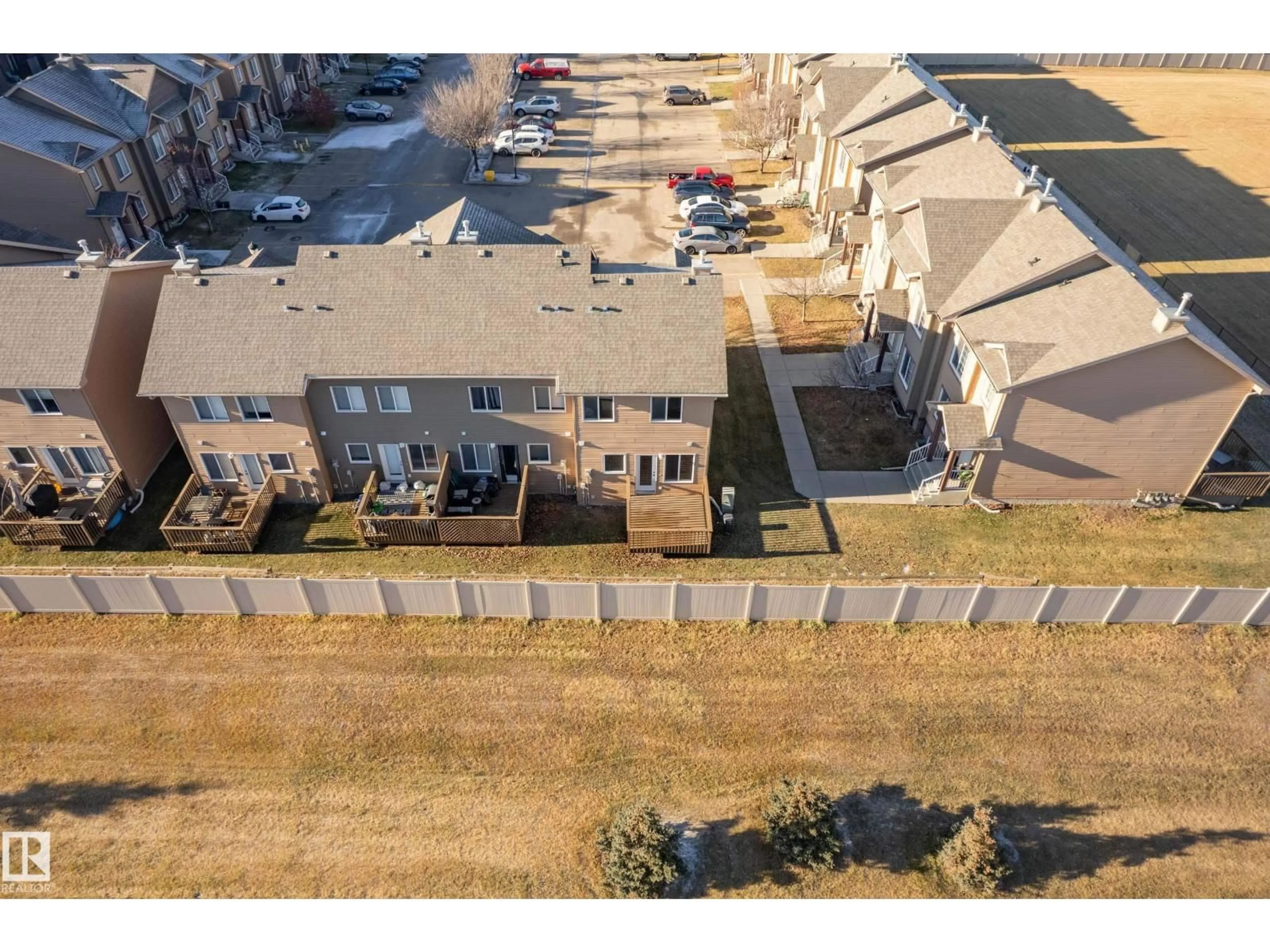 A pic from outside/outdoor area/front of a property/back of a property/a pic from drone, unknown for 320 - 27 SPRUCE RIDGE RD, Spruce Grove Alberta T7X0H5
