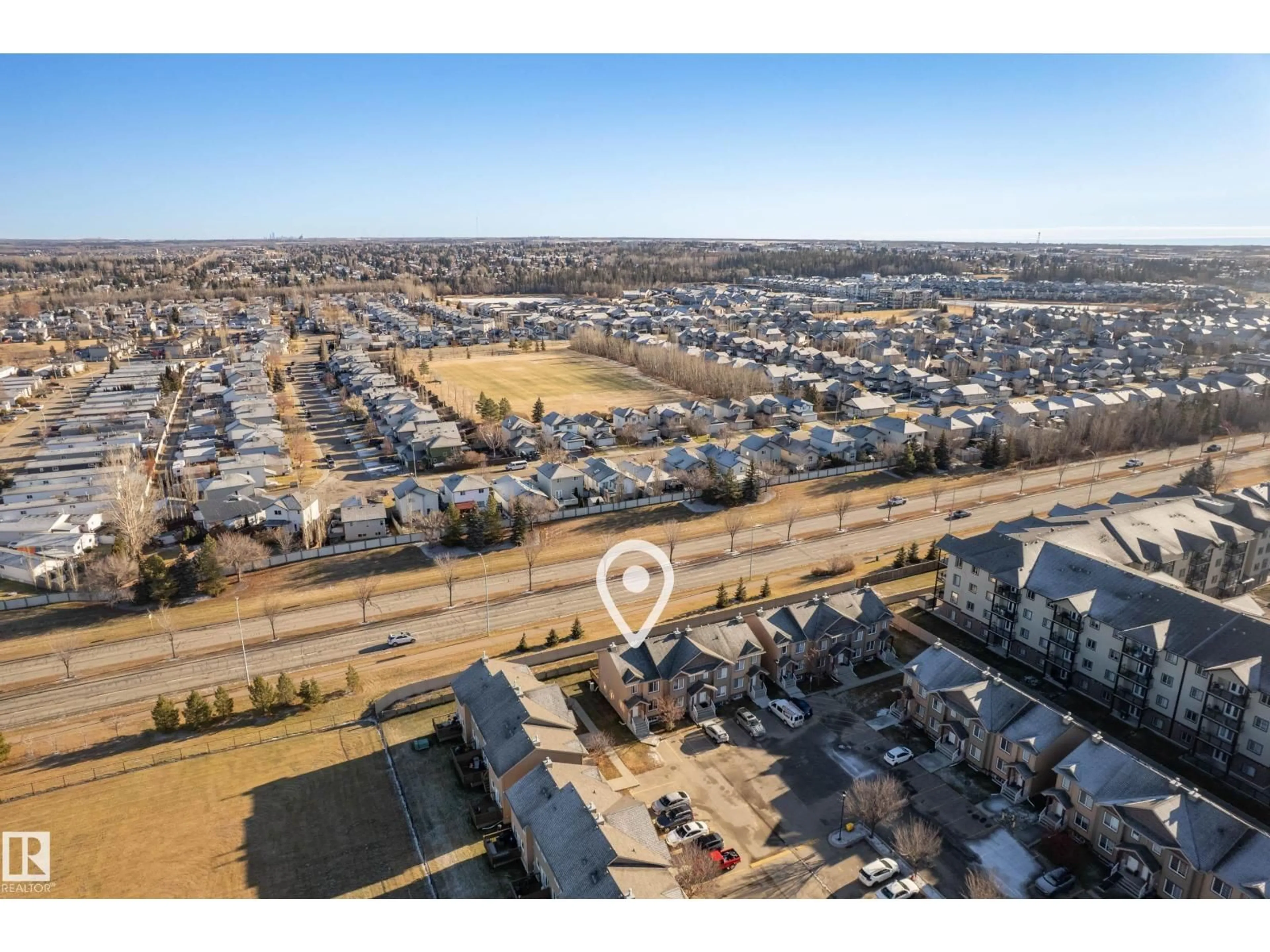 A pic from outside/outdoor area/front of a property/back of a property/a pic from drone, street for 320 - 27 SPRUCE RIDGE RD, Spruce Grove Alberta T7X0H5