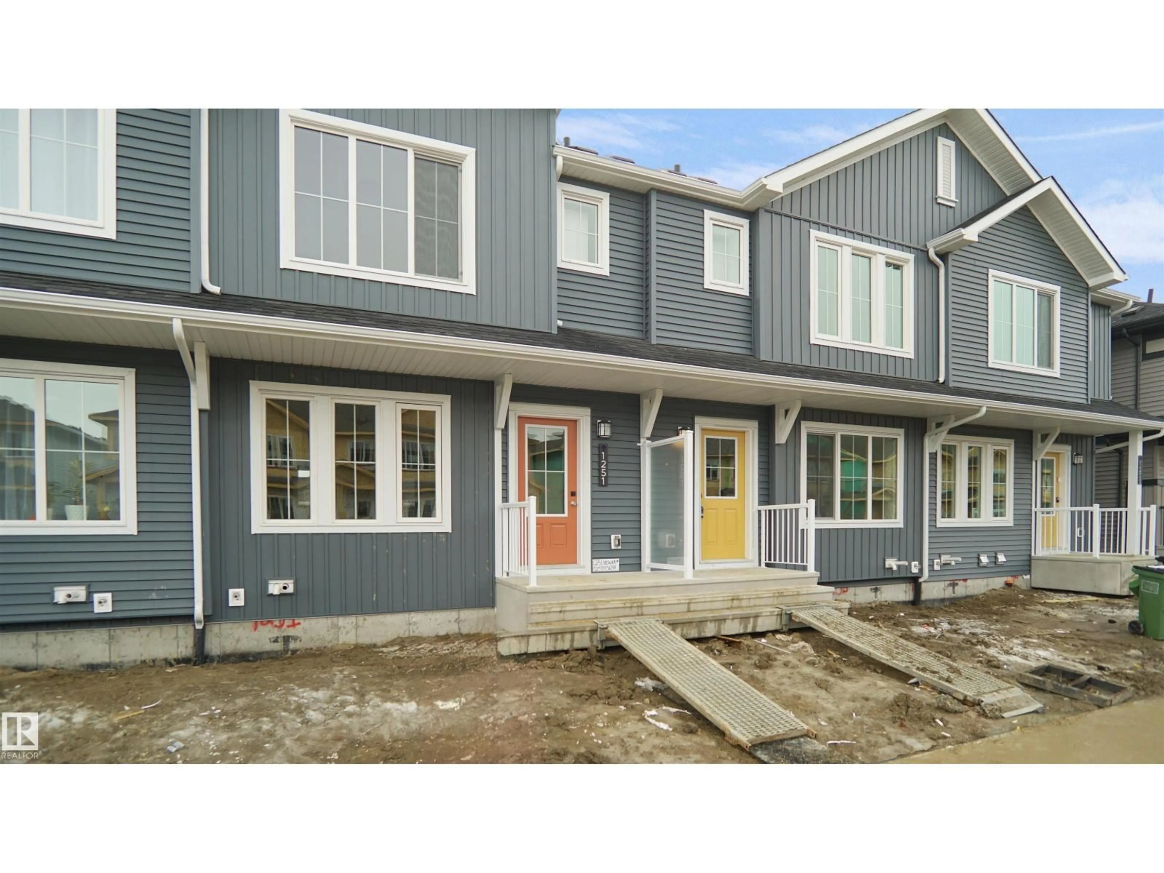 Home with vinyl exterior material, street for 1275 KESWICK DR, Edmonton Alberta T6W4K3