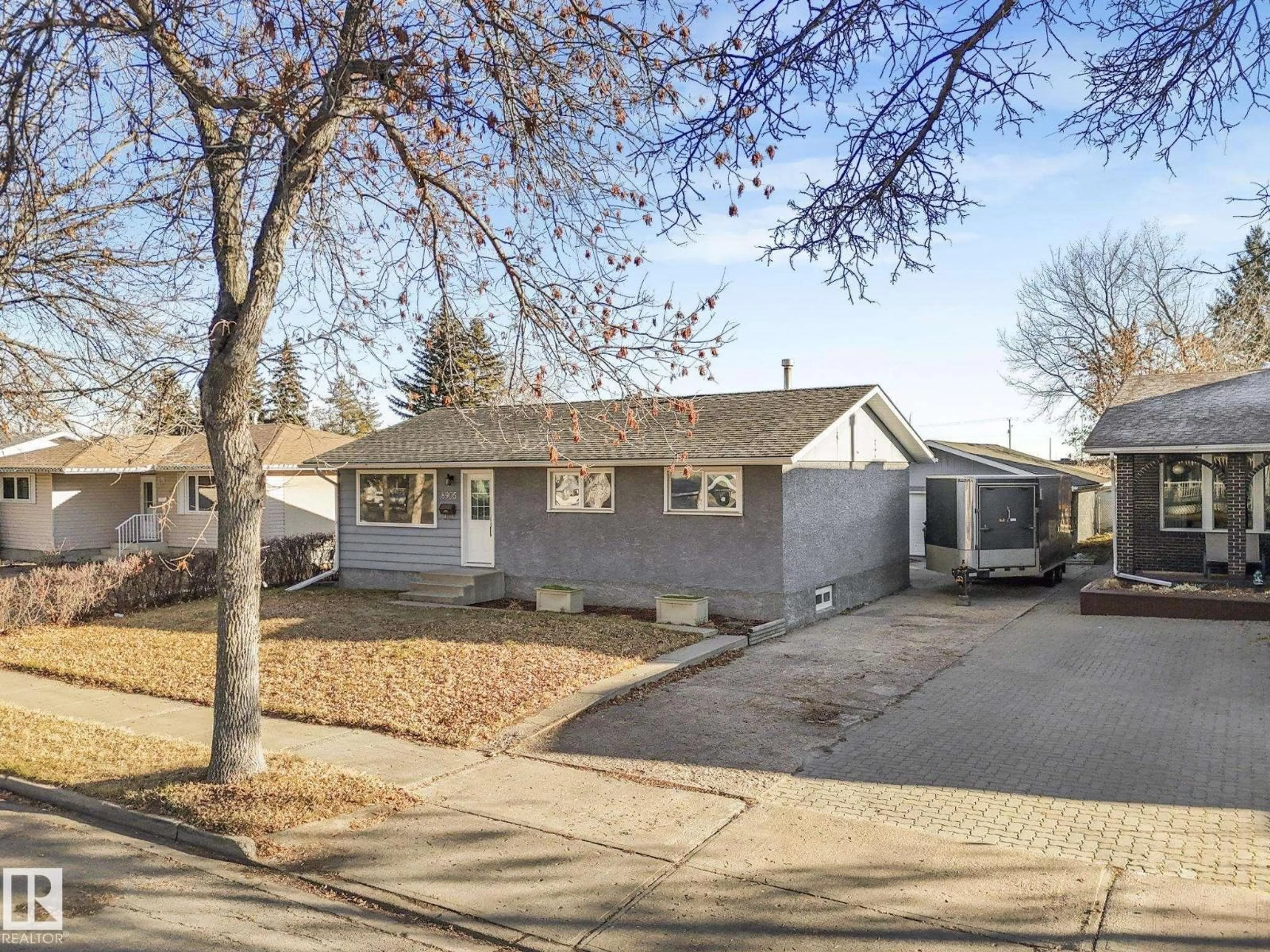 Home with vinyl exterior material, street for 8905 92 AV, Fort Saskatchewan Alberta T8L1A3