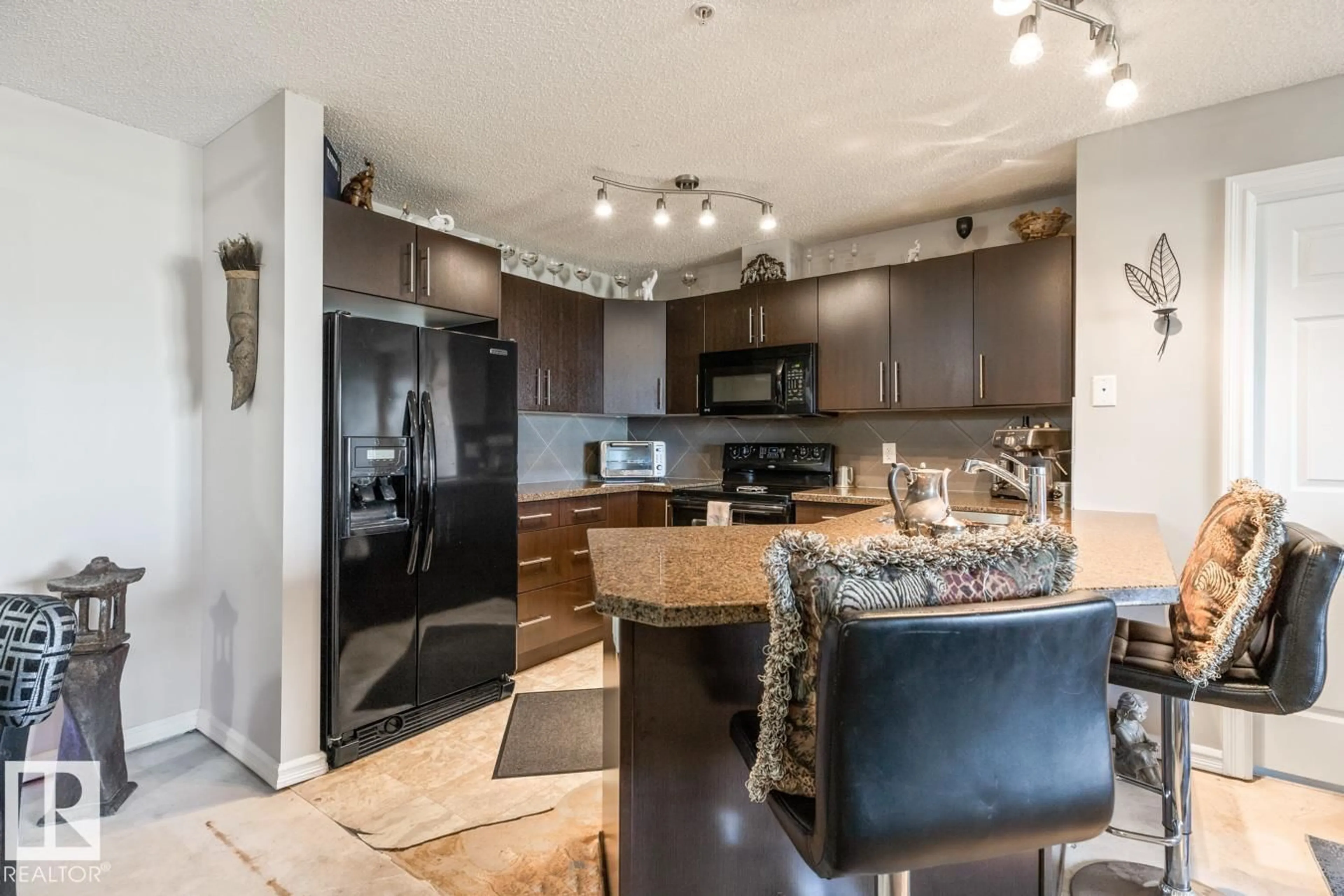 Open concept kitchen, unknown for #115 - 2208 44 AV, Edmonton Alberta T6T0G6