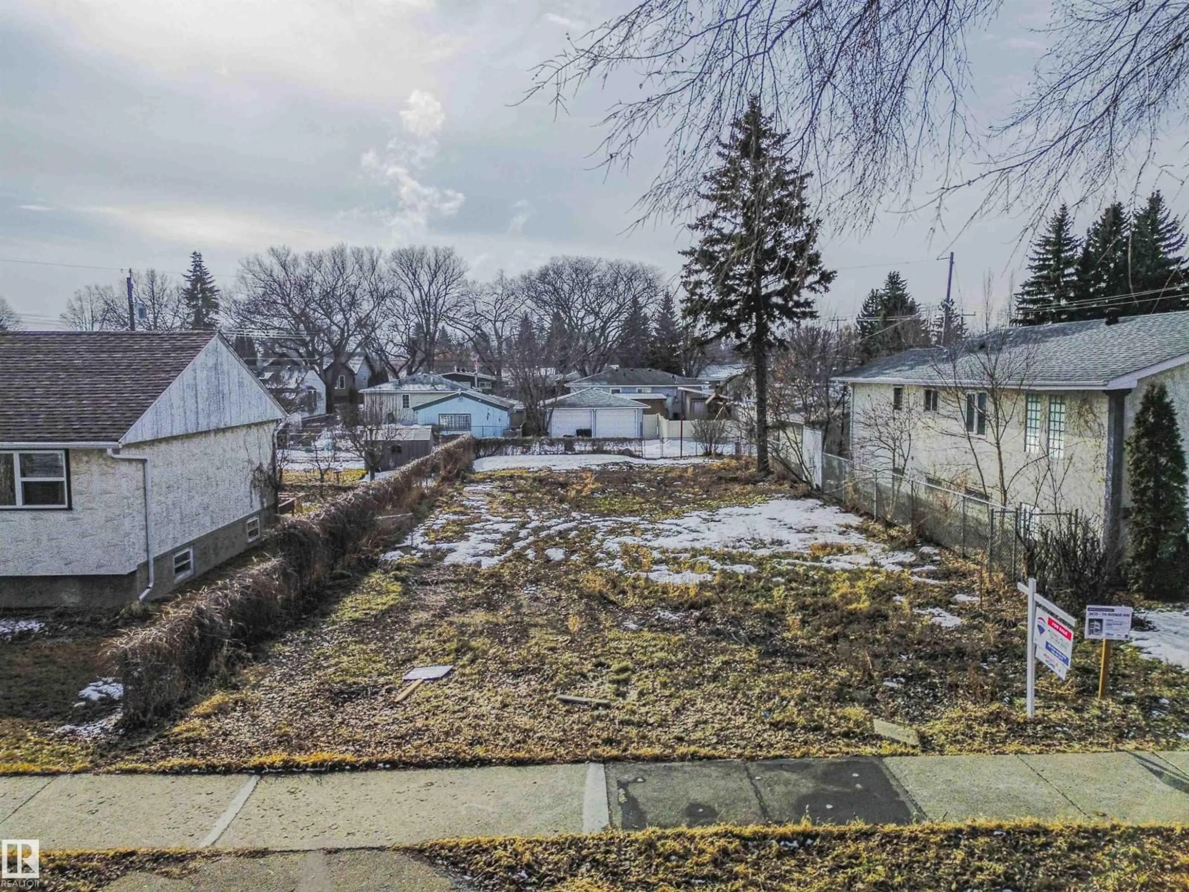 A pic from outside/outdoor area/front of a property/back of a property/a pic from drone, street for 3635 114 AV, Edmonton Alberta T6E4G5