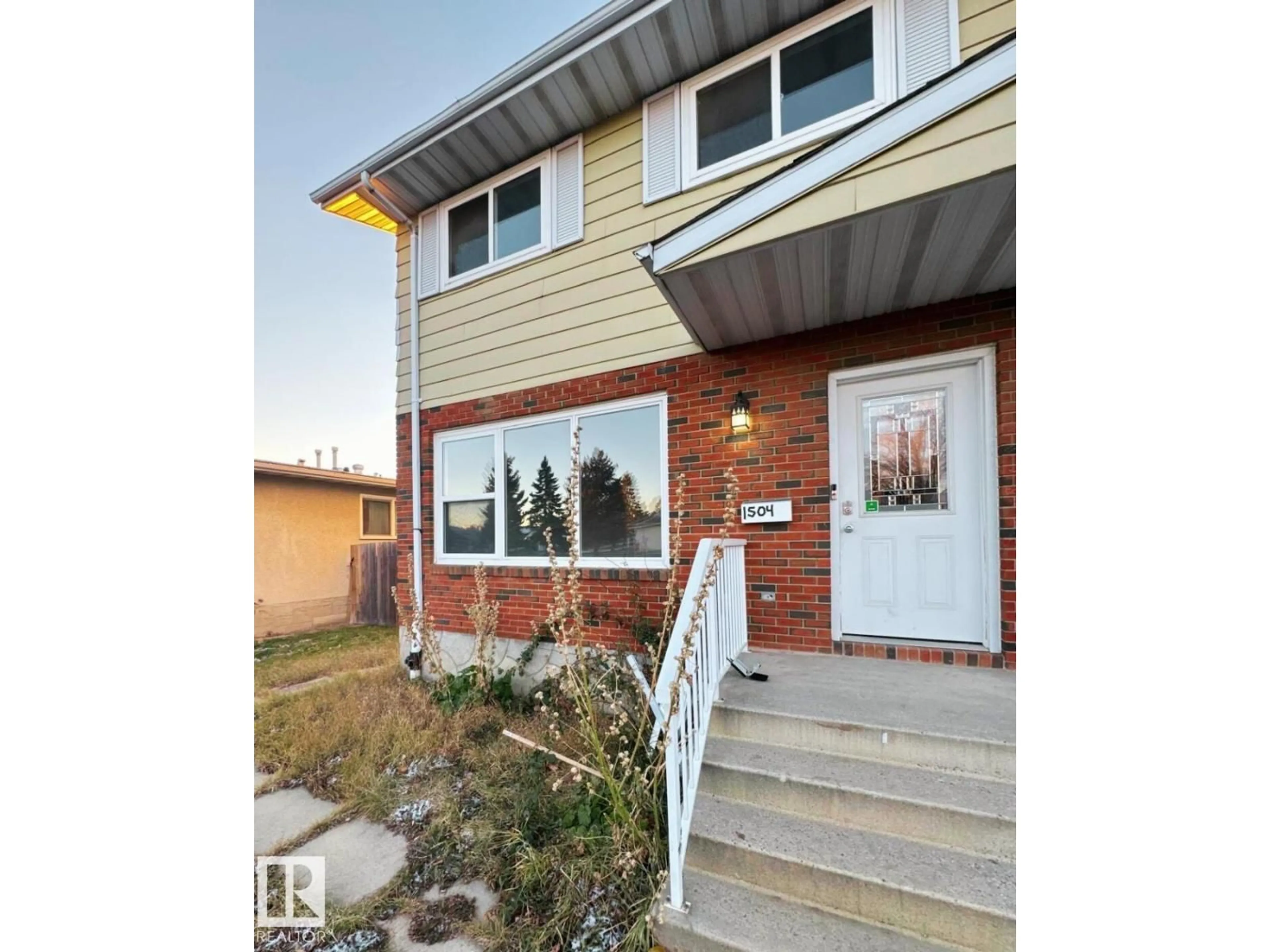 Home with brick exterior material, street for 1504 62 ST, Edmonton Alberta T6L1S8