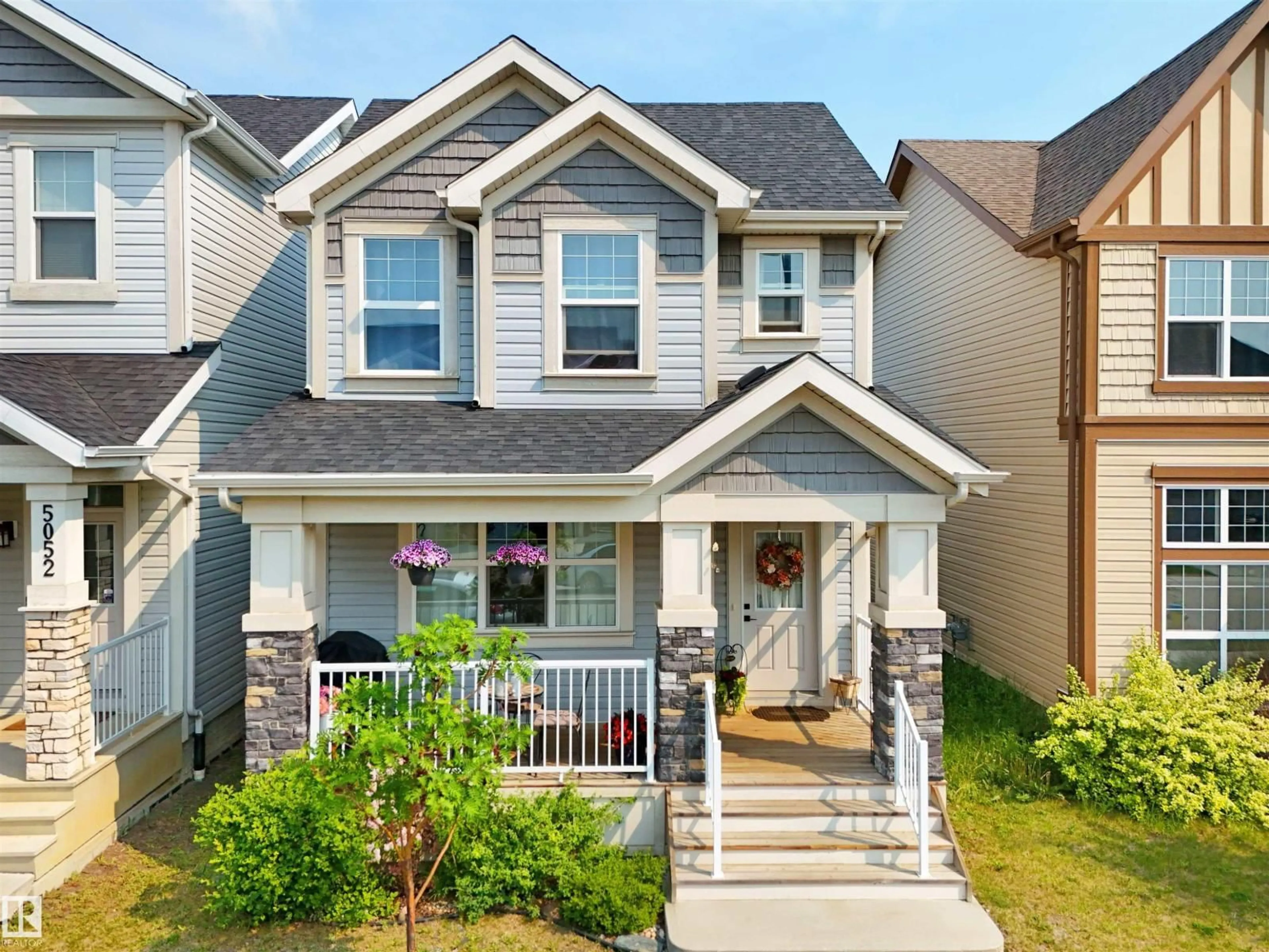 Home with vinyl exterior material, street for 5050 ANDISON CL, Edmonton Alberta T6W3T4