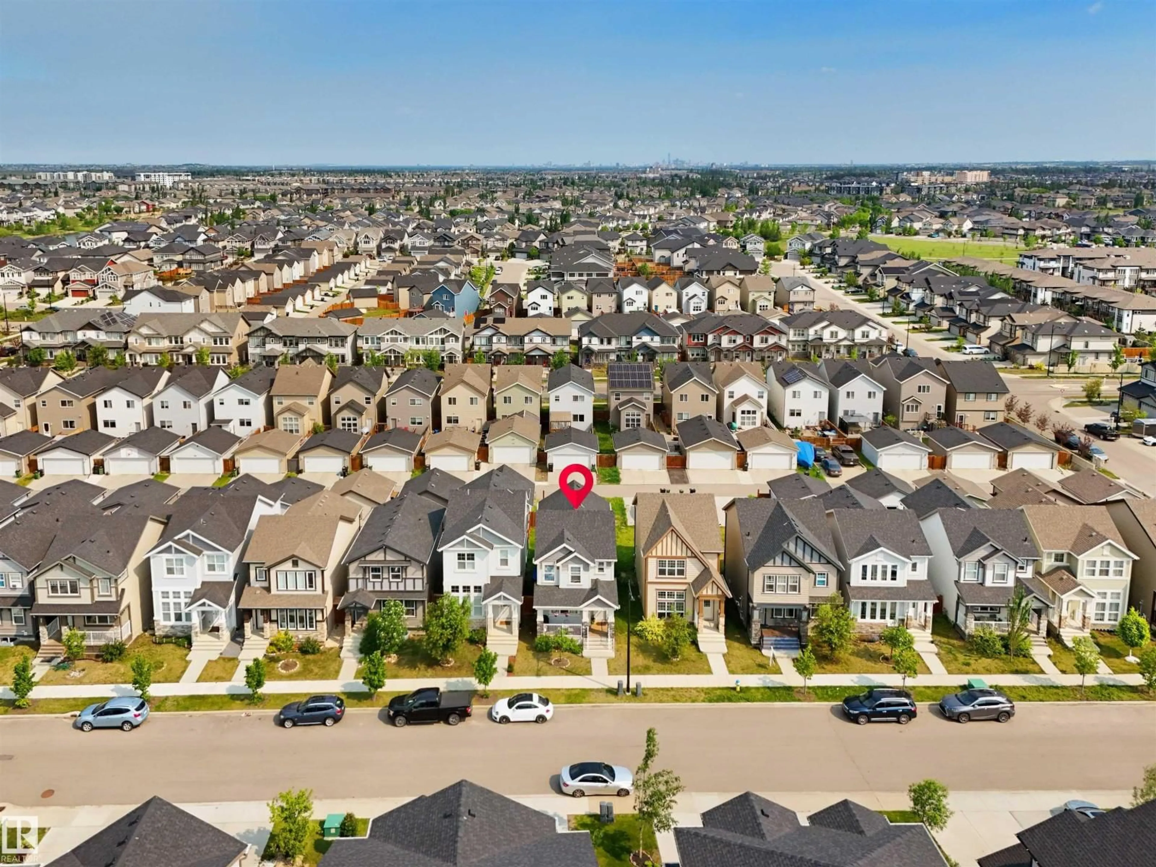 A pic from outside/outdoor area/front of a property/back of a property/a pic from drone, street for 5050 ANDISON CL, Edmonton Alberta T6W3T4