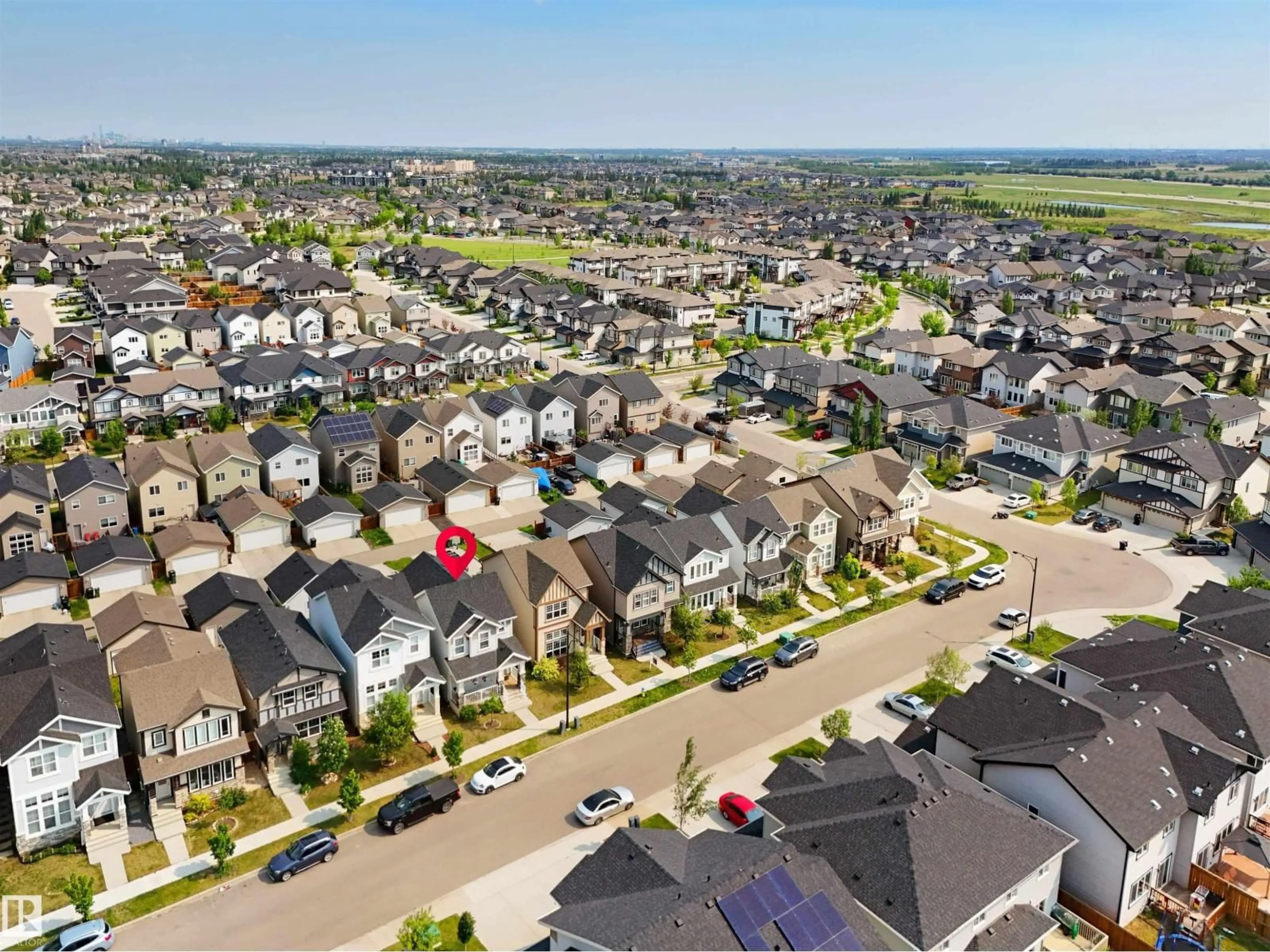 A pic from outside/outdoor area/front of a property/back of a property/a pic from drone, street for 5050 ANDISON CL, Edmonton Alberta T6W3T4