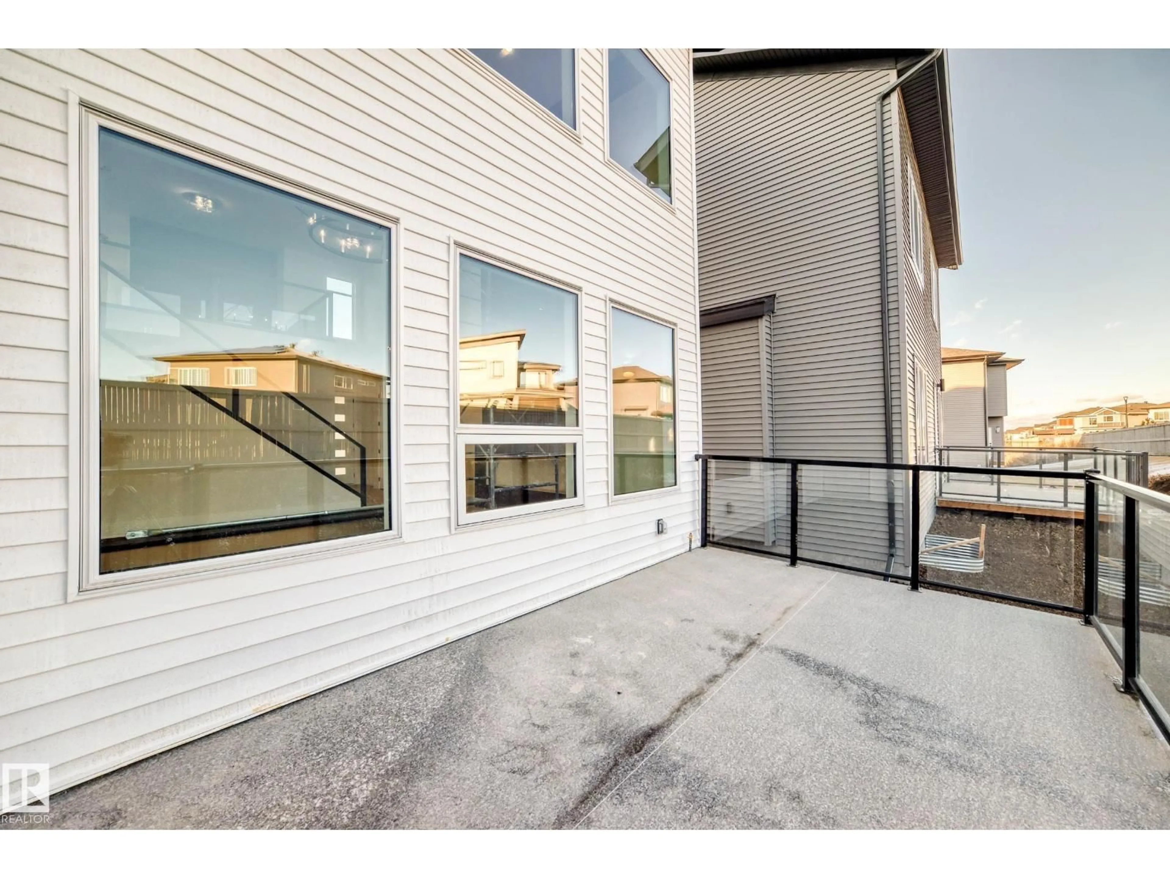 Patio, street for 7025 KIVIAQ CR, Edmonton Alberta T6W5R2