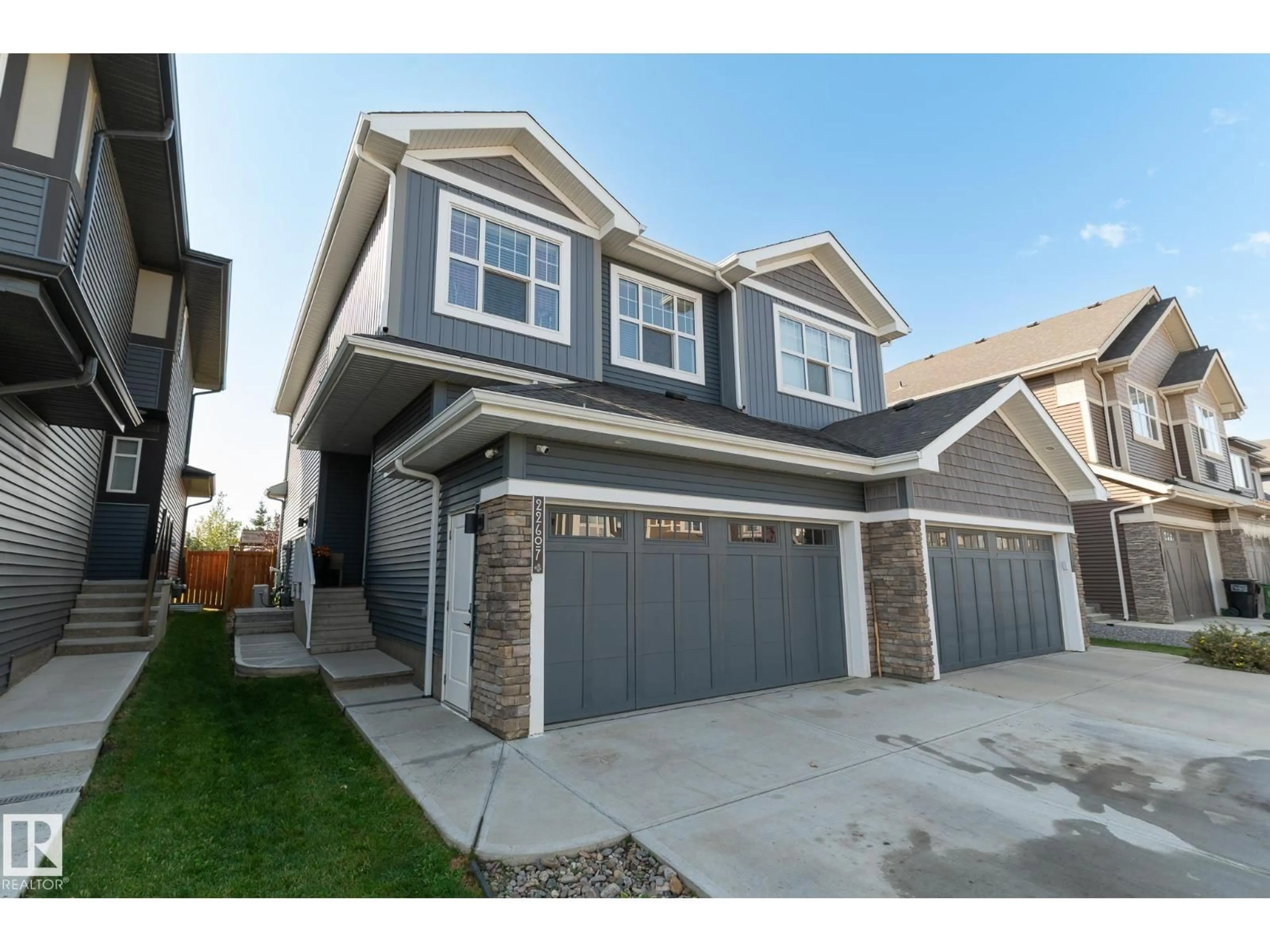 Home with vinyl exterior material, street for 22607 80 AV, Edmonton Alberta T5T7H8