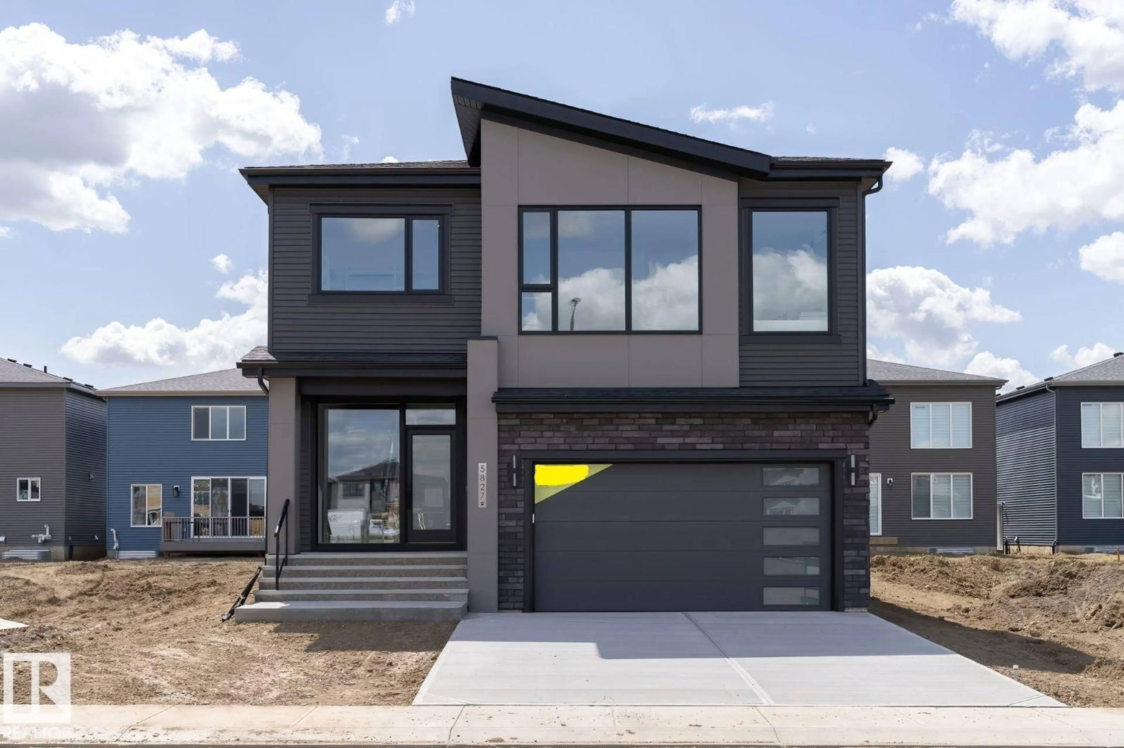 Home with vinyl exterior material, street for LI SW - 5827 KOOTOOK LINK, Edmonton Alberta T6W1A5