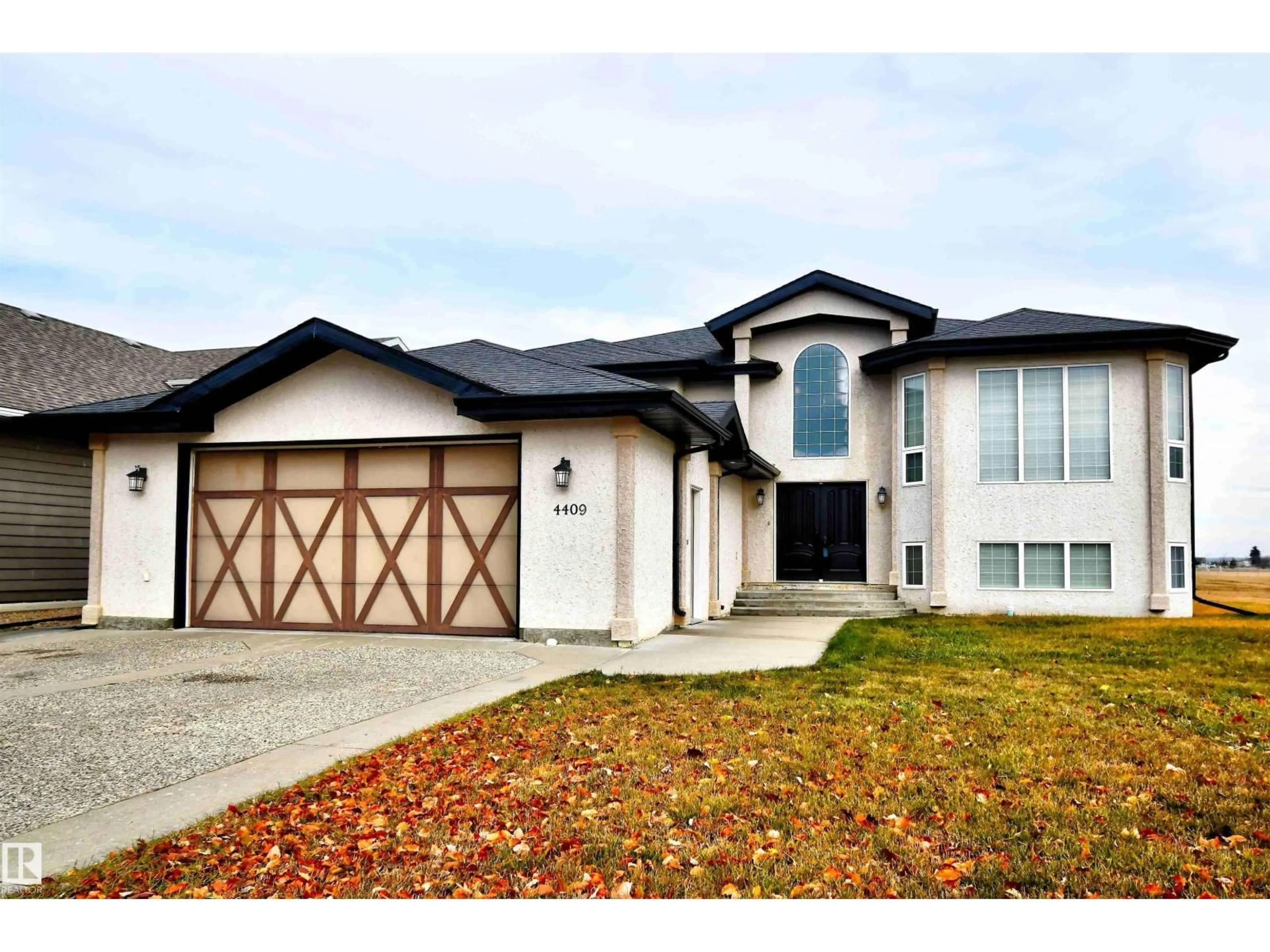 Home with vinyl exterior material, street for 4409 44 ST, St. Paul Town Alberta T0A3A3