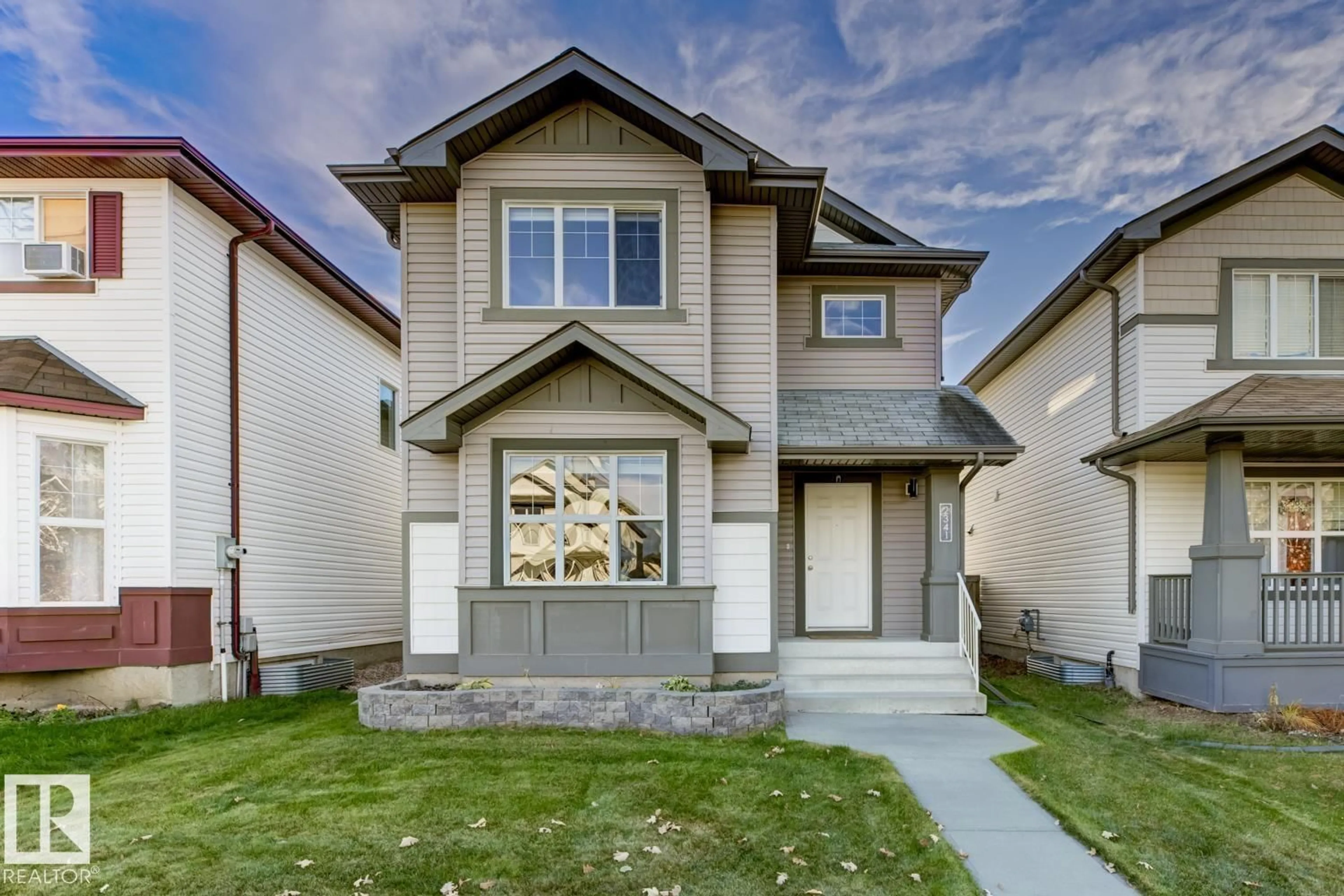Home with vinyl exterior material, street for 2341 29A AV, Edmonton Alberta T6T2B1