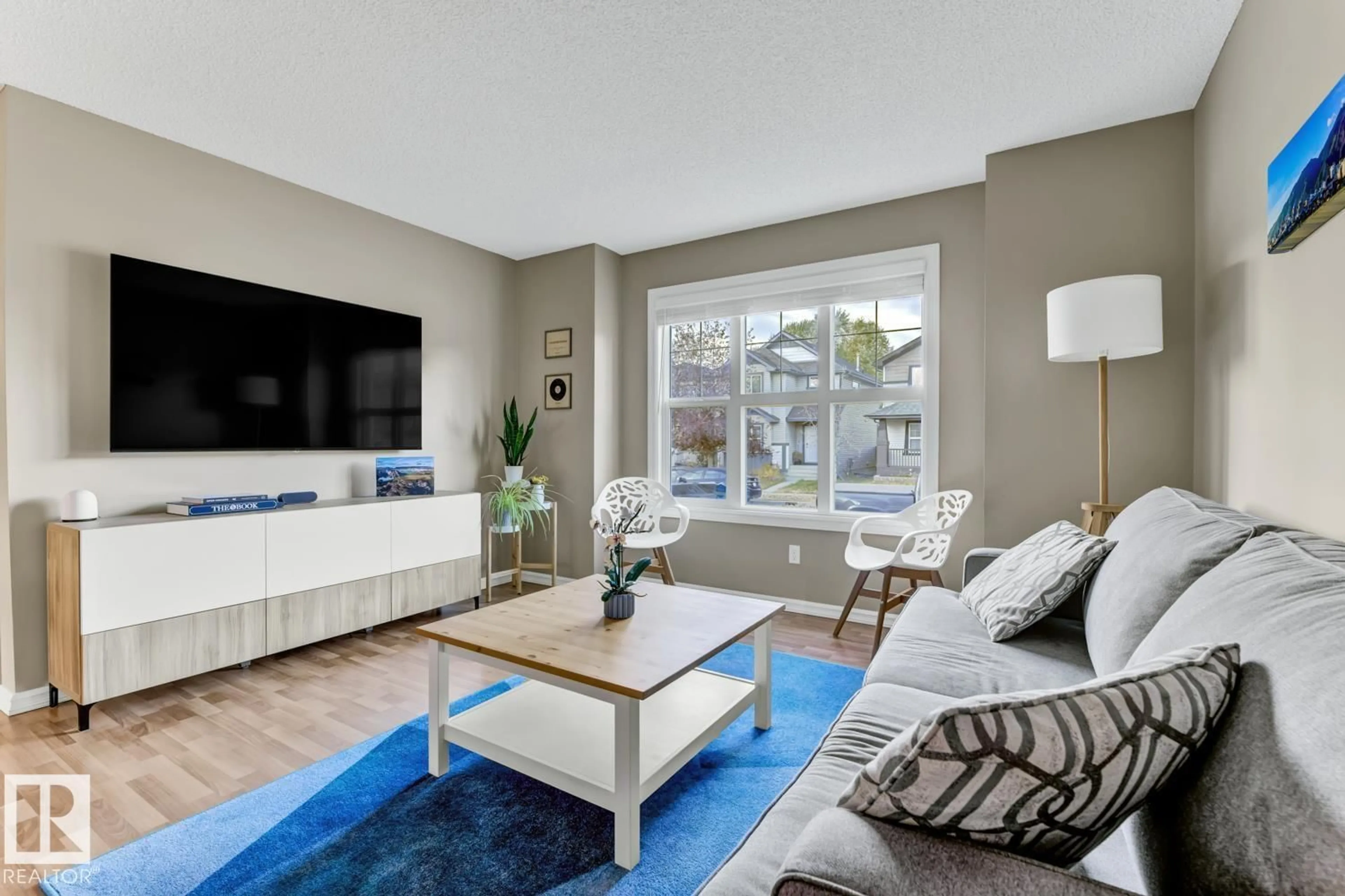 Living room with furniture, unknown for 2341 29A AV, Edmonton Alberta T6T2B1