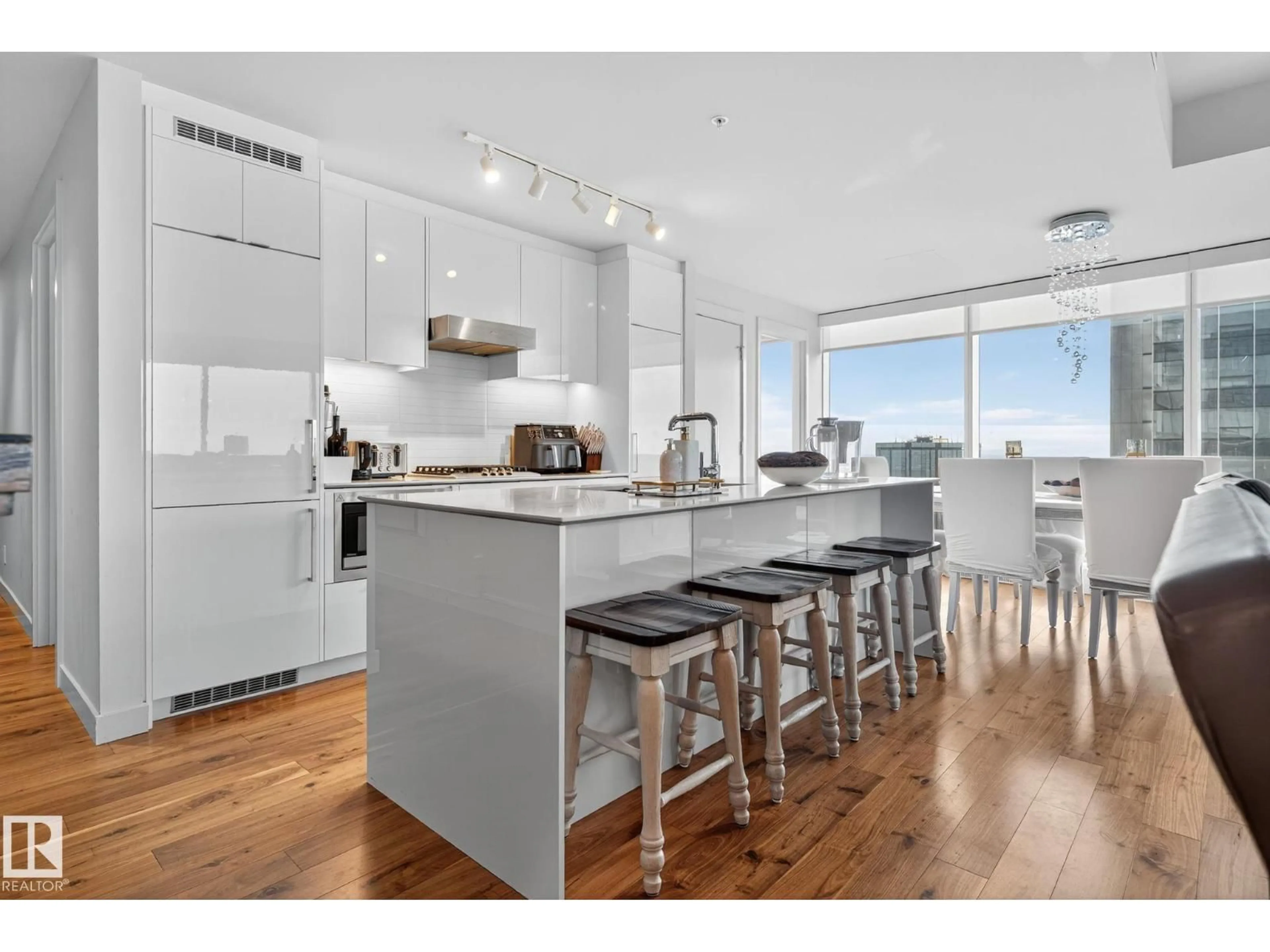 Open concept kitchen, wood/laminate floor for 10360 - 4206 102 ST NW, Edmonton Alberta T5J0K6