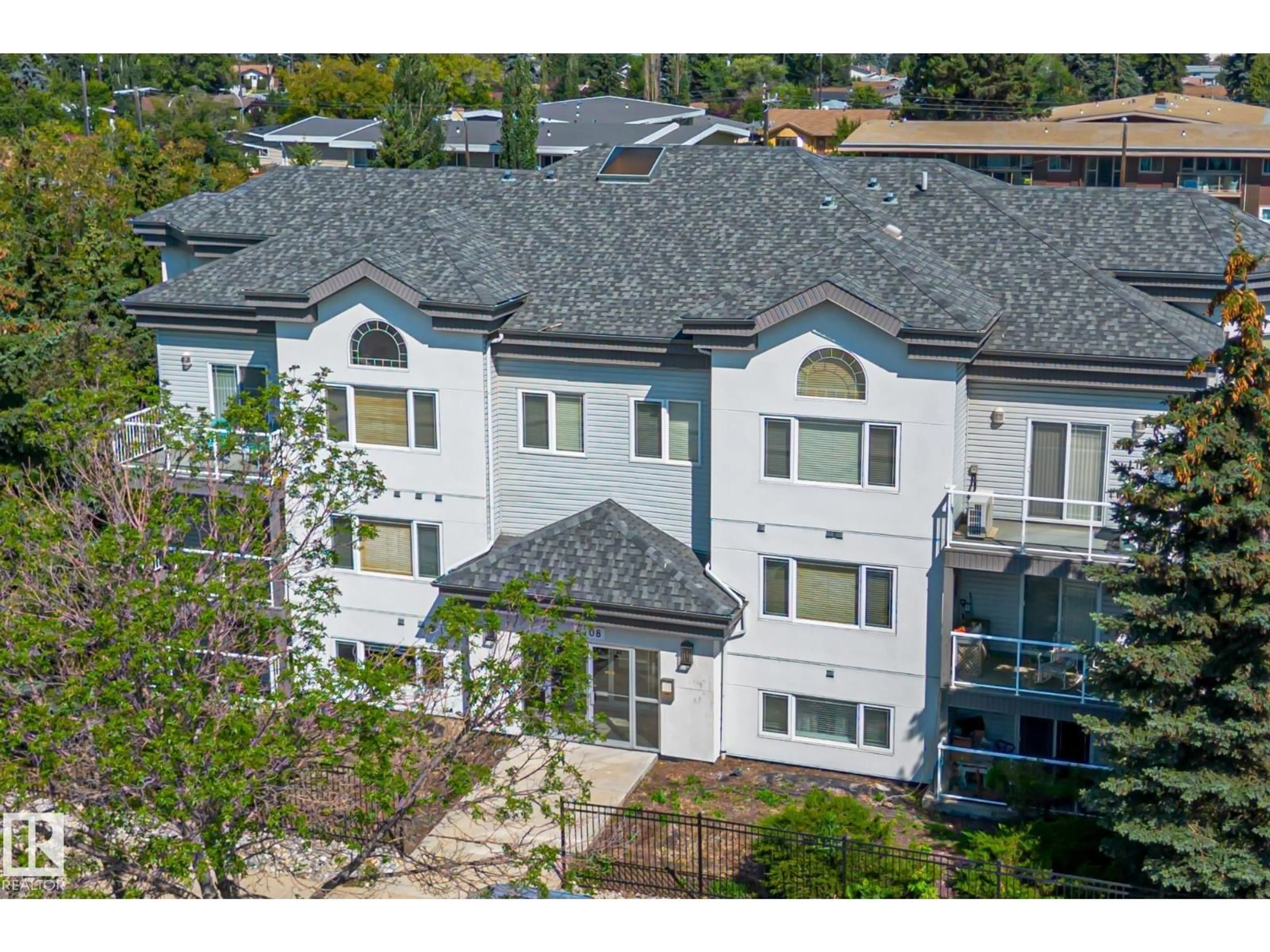 A pic from outside/outdoor area/front of a property/back of a property/a pic from drone, unknown for #209 - 6708 90 AV, Edmonton Alberta T6B0P2