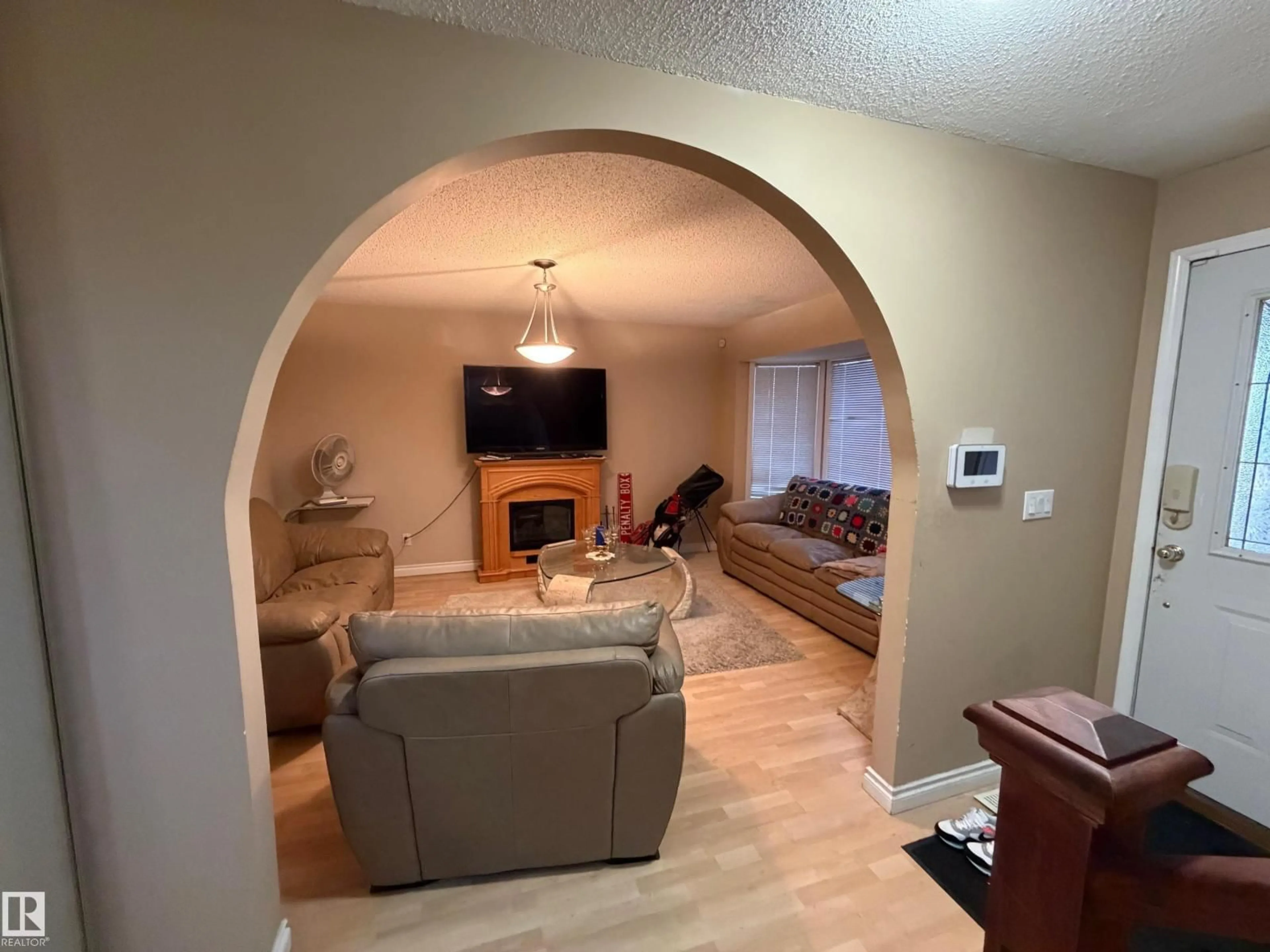 Living room with furniture, unknown for 3841 62 ST, Edmonton Alberta T6L1A4