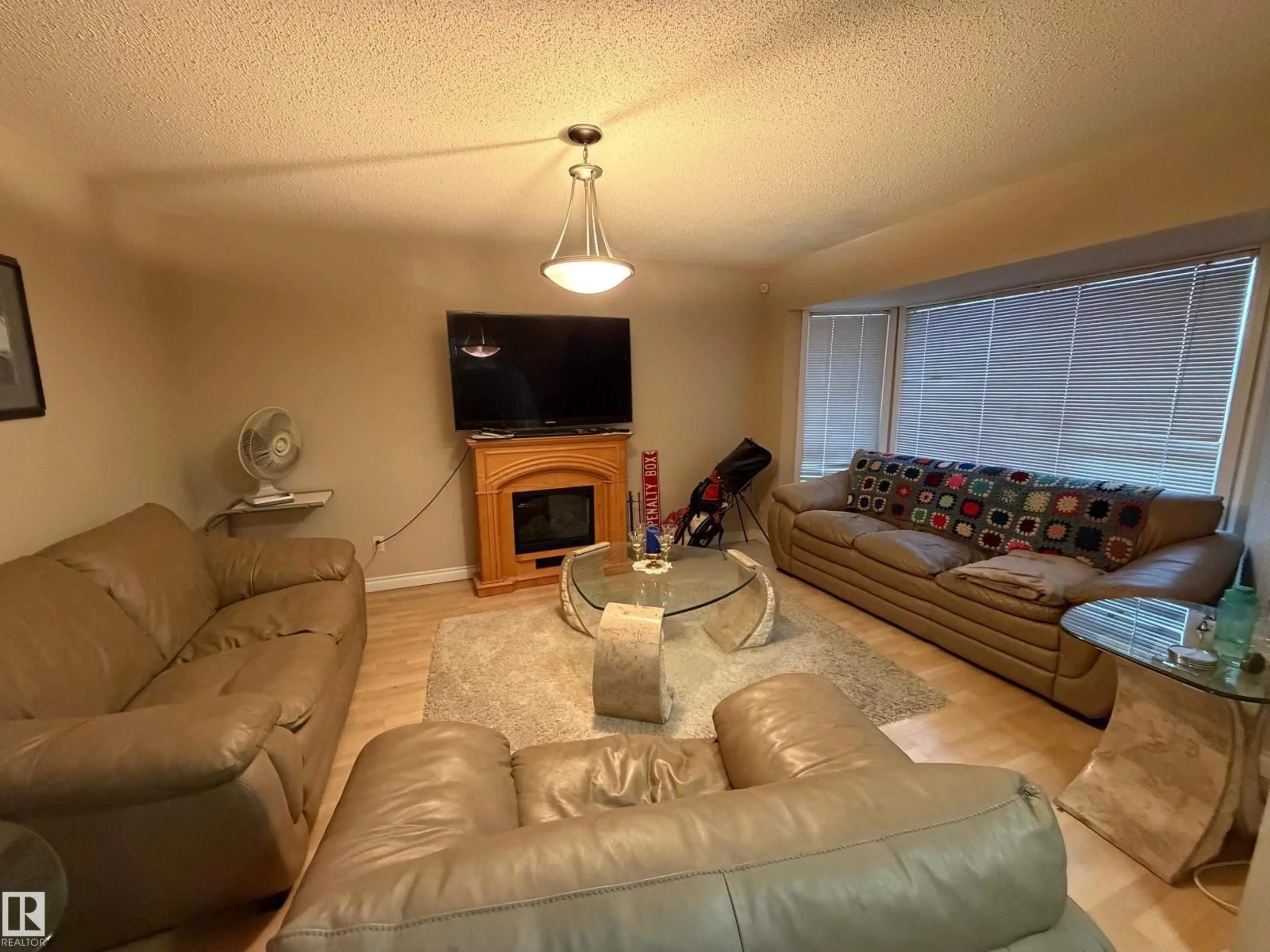 Living room with furniture, unknown for 3841 62 ST, Edmonton Alberta T6L1A4