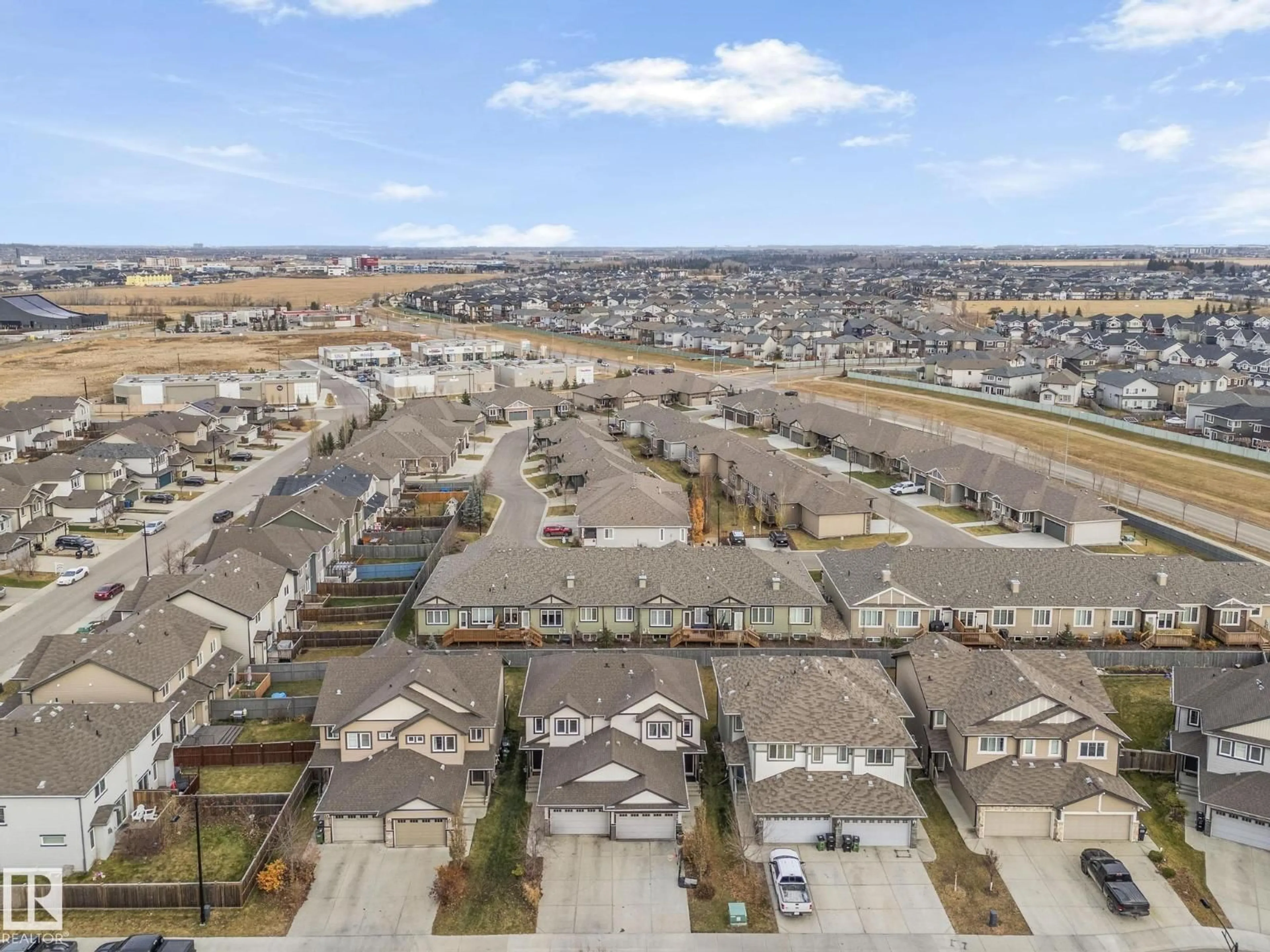 A pic from outside/outdoor area/front of a property/back of a property/a pic from drone, unknown for SW SW - 7237 ARMOUR CR, Edmonton Alberta T6W2S1