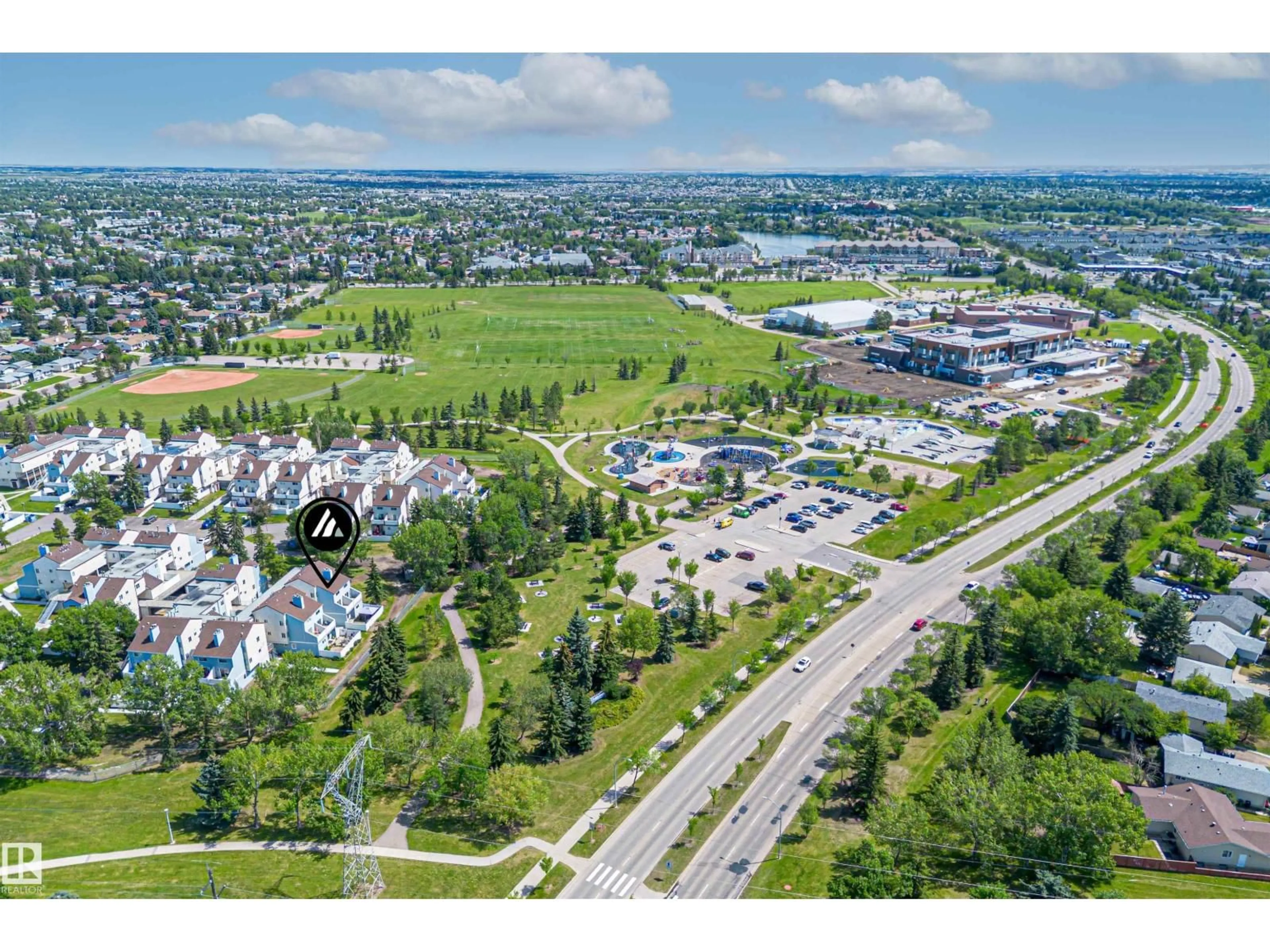 A pic from outside/outdoor area/front of a property/back of a property/a pic from drone, street for 189 LANCASTER TC, Edmonton Alberta T5X5T2