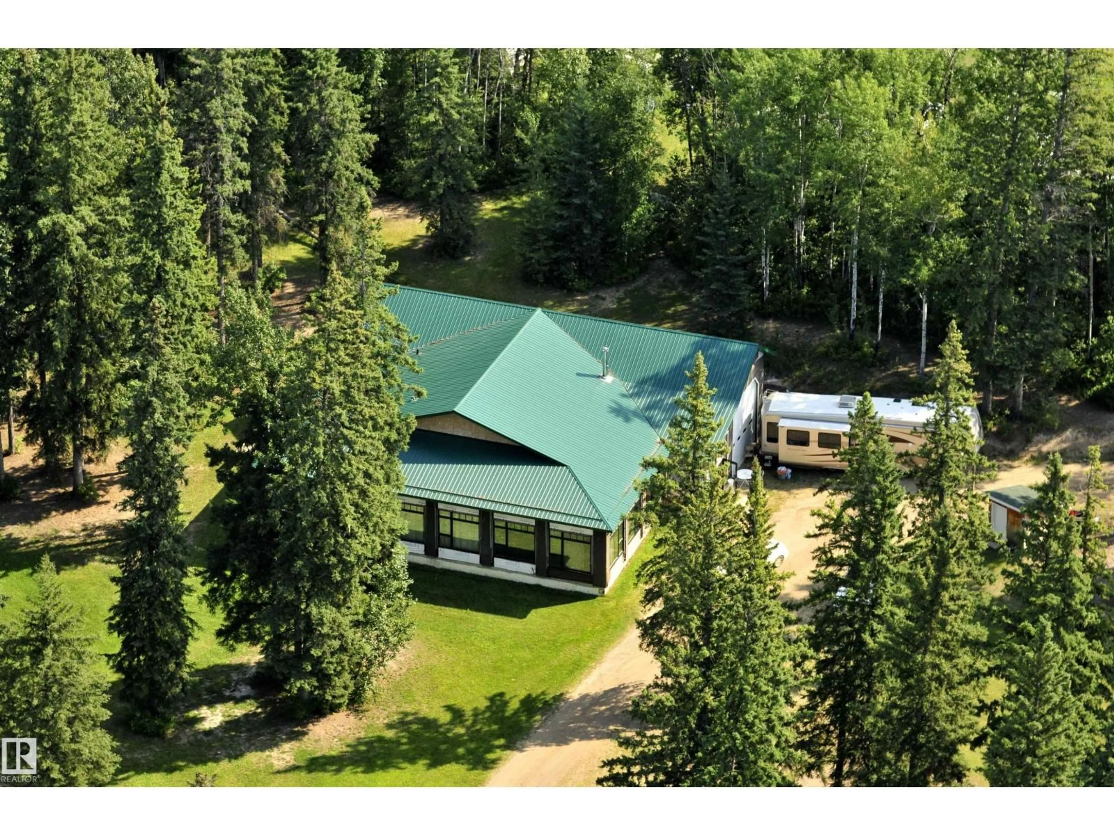 A pic from outside/outdoor area/front of a property/back of a property/a pic from drone, forest/trees view for 673001A RGE ROAD 215, Rural Athabasca County Alberta T9S2A2