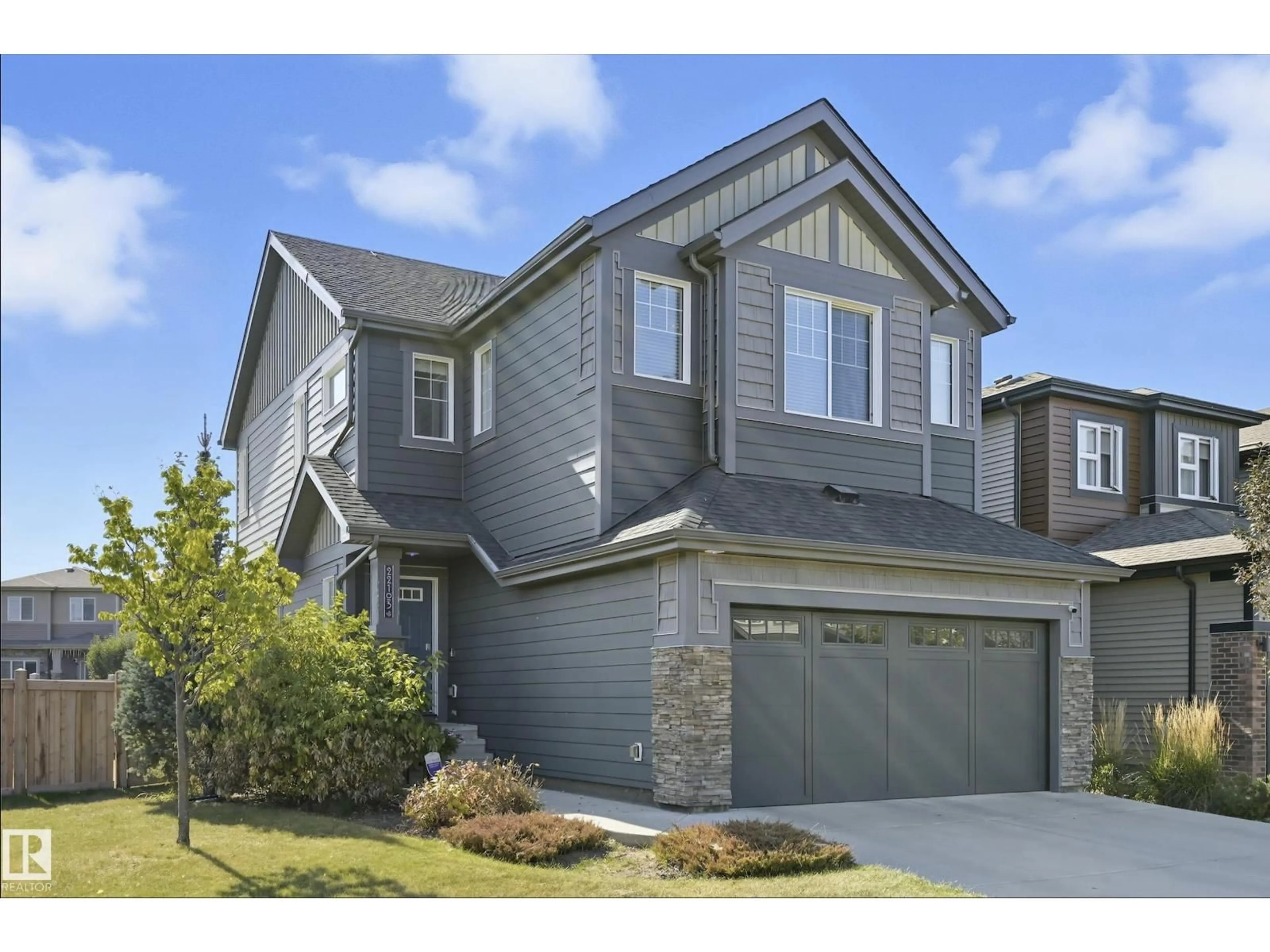 Home with vinyl exterior material, street for 22103 87 AV, Edmonton Alberta T5T7H7