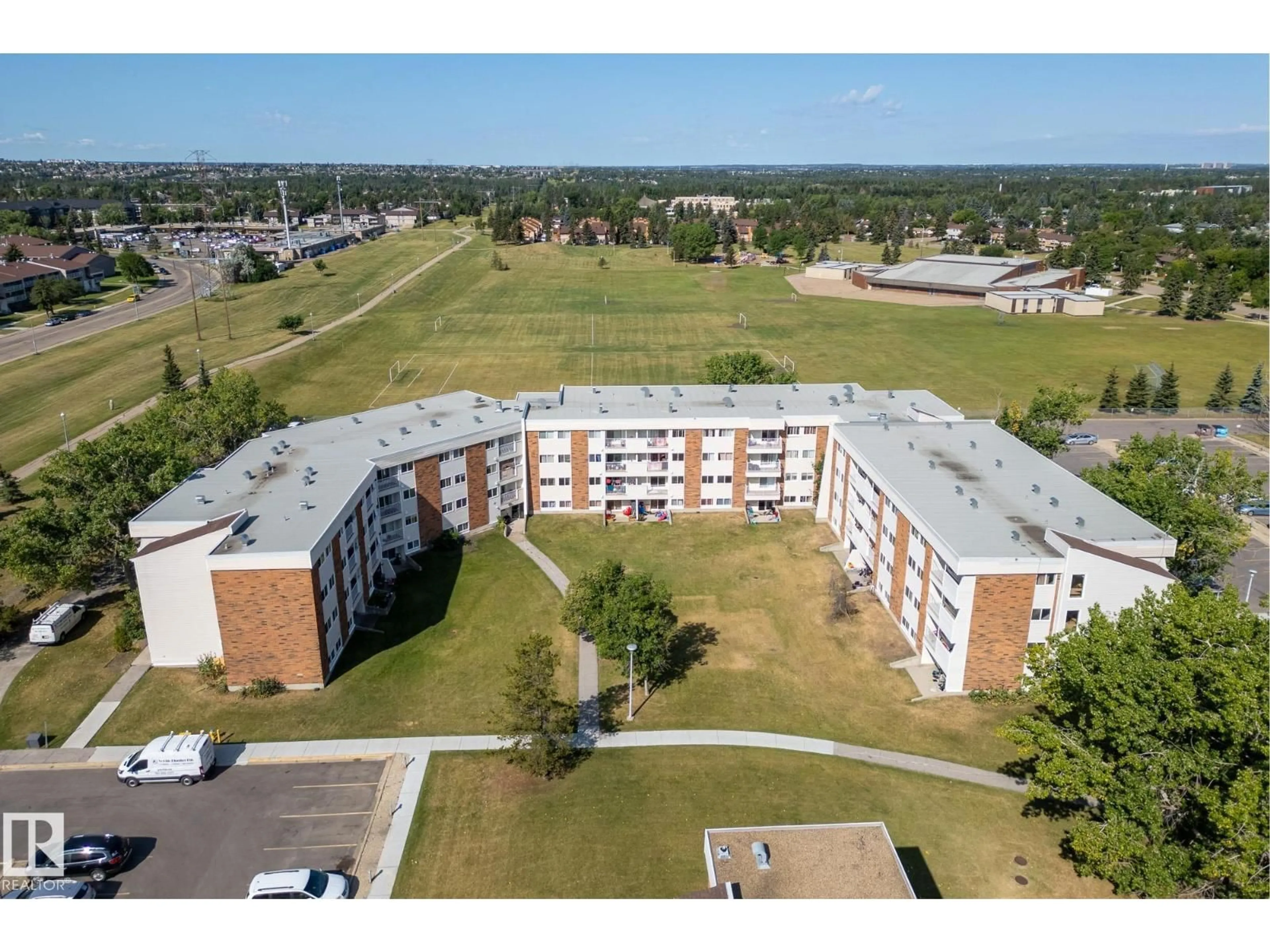A pic from outside/outdoor area/front of a property/back of a property/a pic from drone, unknown for #22 - 11265 31 AV, Edmonton Alberta T6J3V7