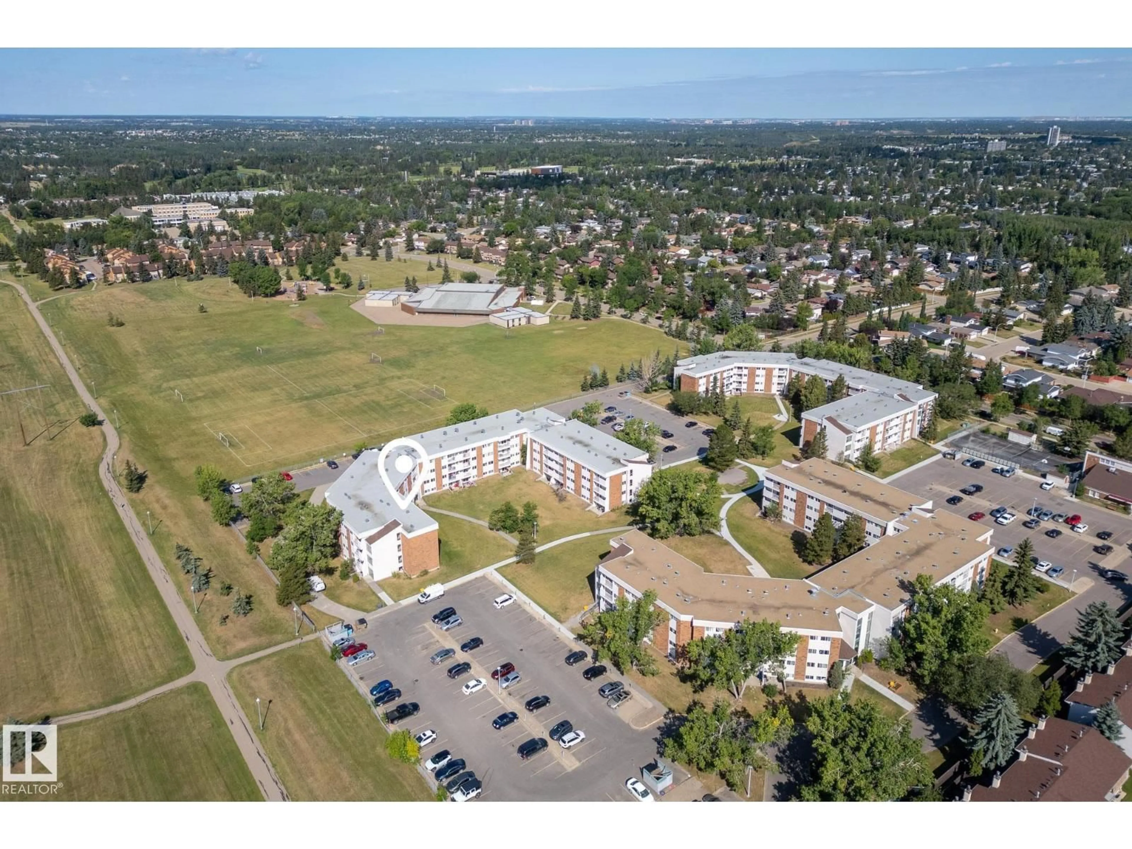 A pic from outside/outdoor area/front of a property/back of a property/a pic from drone, unknown for #22 - 11265 31 AV, Edmonton Alberta T6J3V7