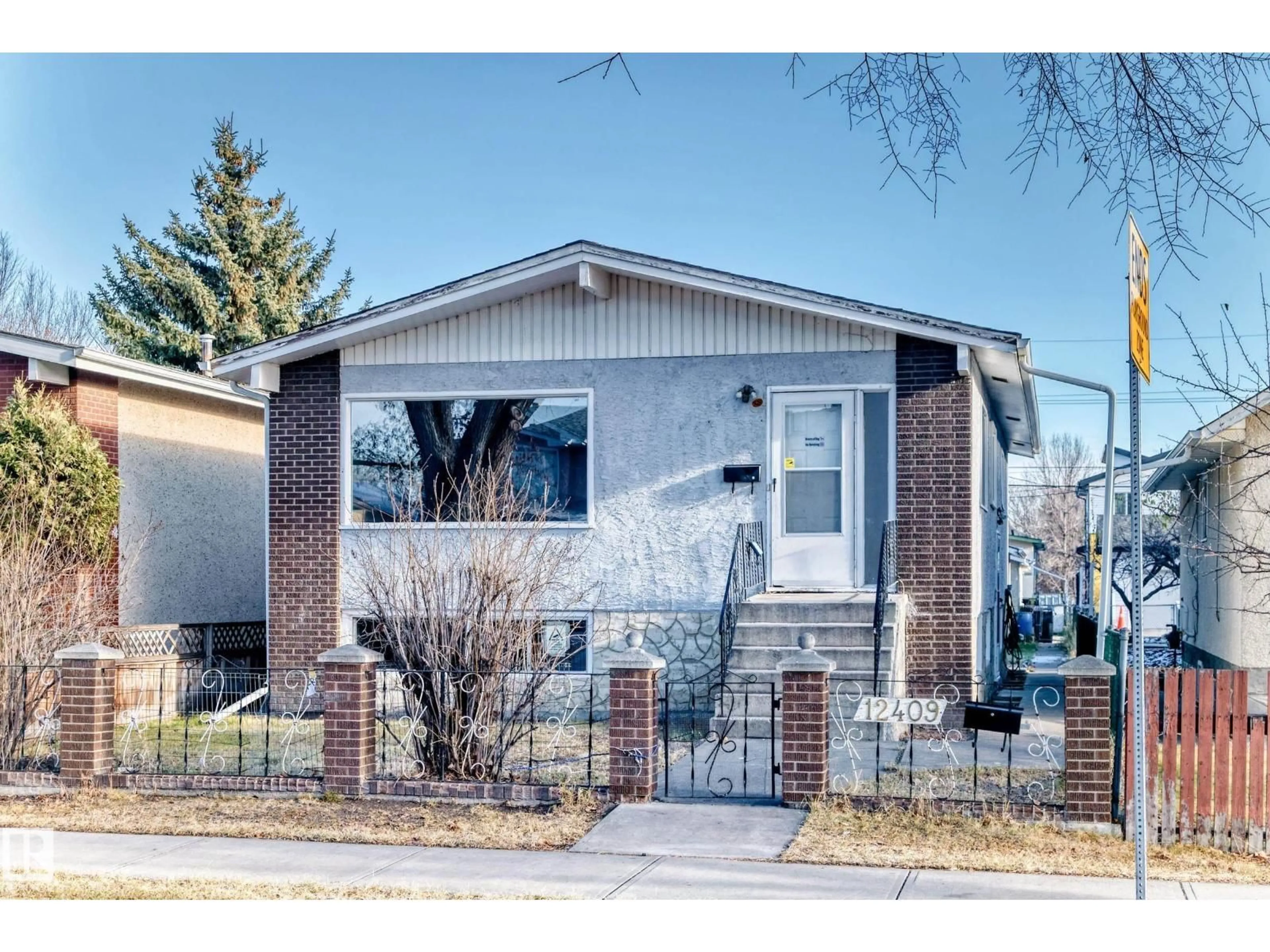 Home with brick exterior material, street for NW - 12409 87 ST, Edmonton Alberta T5B3P4