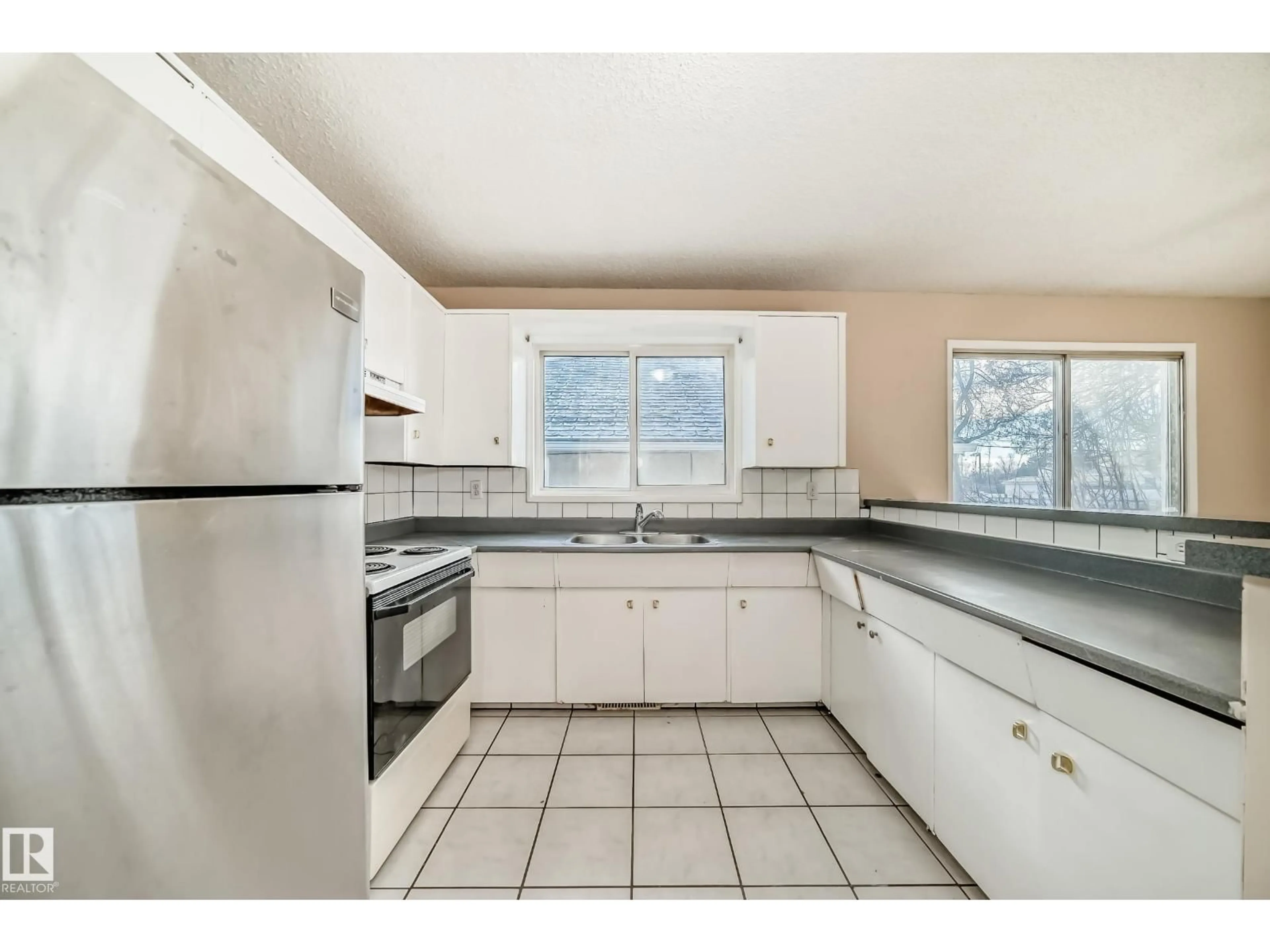 Standard kitchen, ceramic/tile floor for NW - 12409 87 ST, Edmonton Alberta T5B3P4