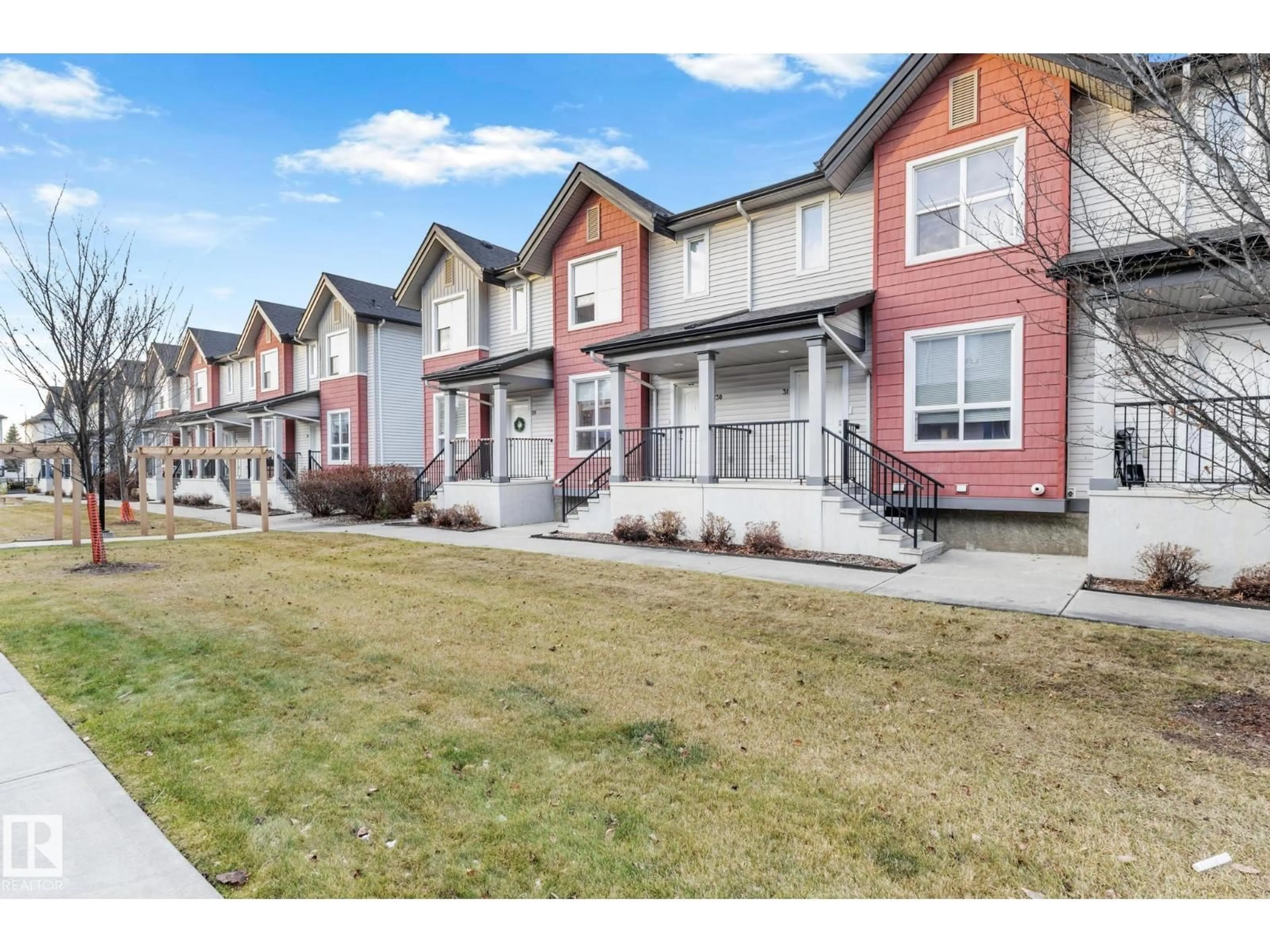 A pic from outside/outdoor area/front of a property/back of a property/a pic from drone, street for 30 6075 SCHONSEE WY, Edmonton Alberta T5Z0H4