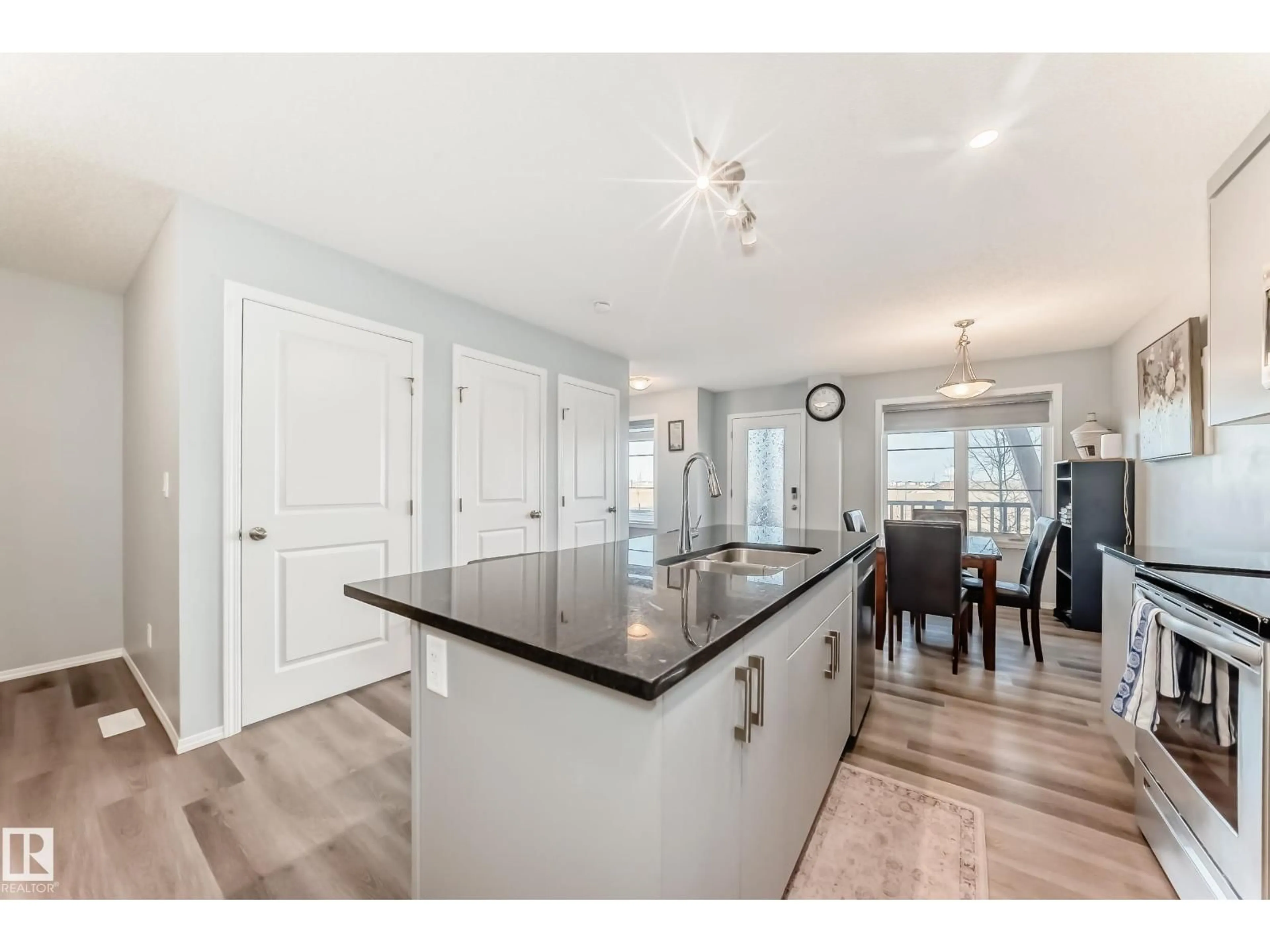 Open concept kitchen, unknown for 1002 STILLWATER BV, Edmonton Alberta T6M1M8