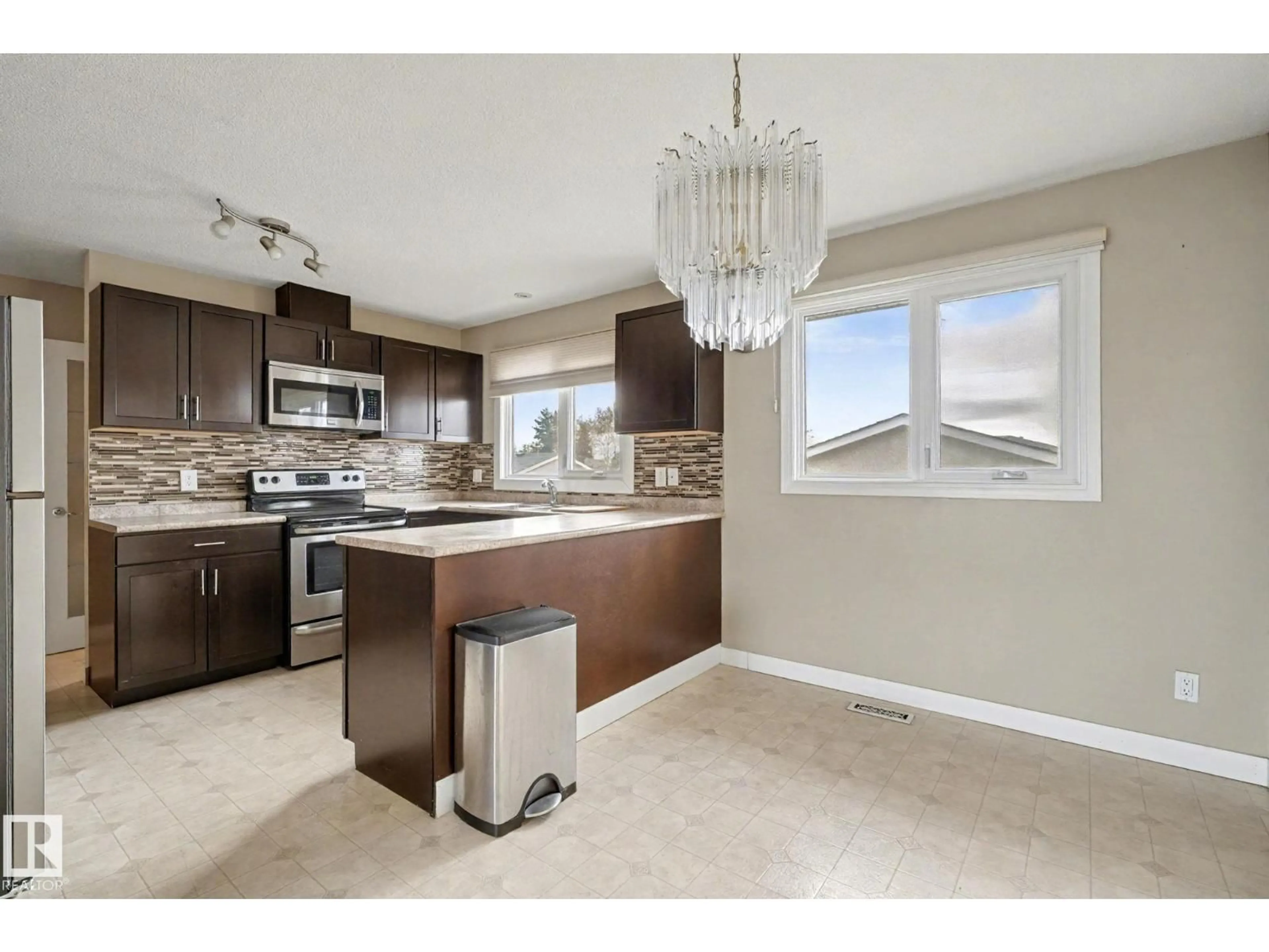 Open concept kitchen, unknown for 8407 149A AV, Edmonton Alberta T5E2M9