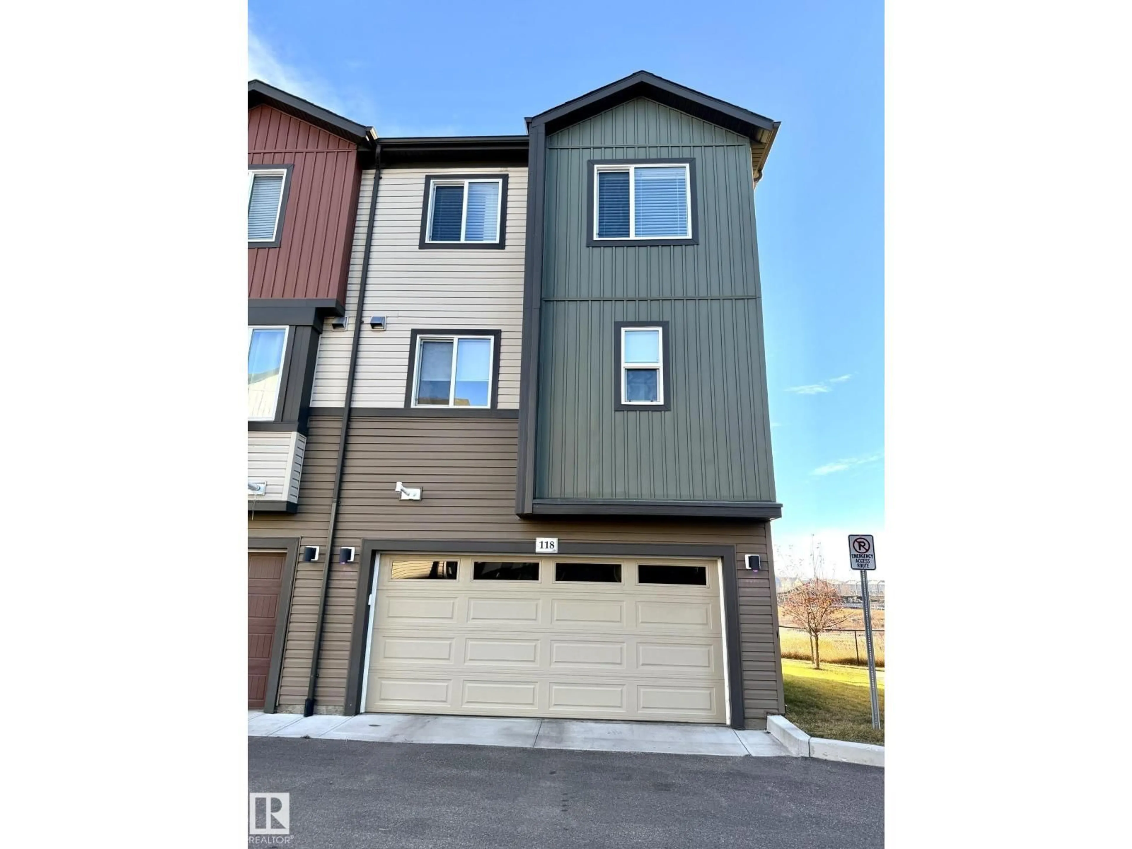 Home with vinyl exterior material, street for #118 - 16903 68 ST, Edmonton Alberta T5Z0R1