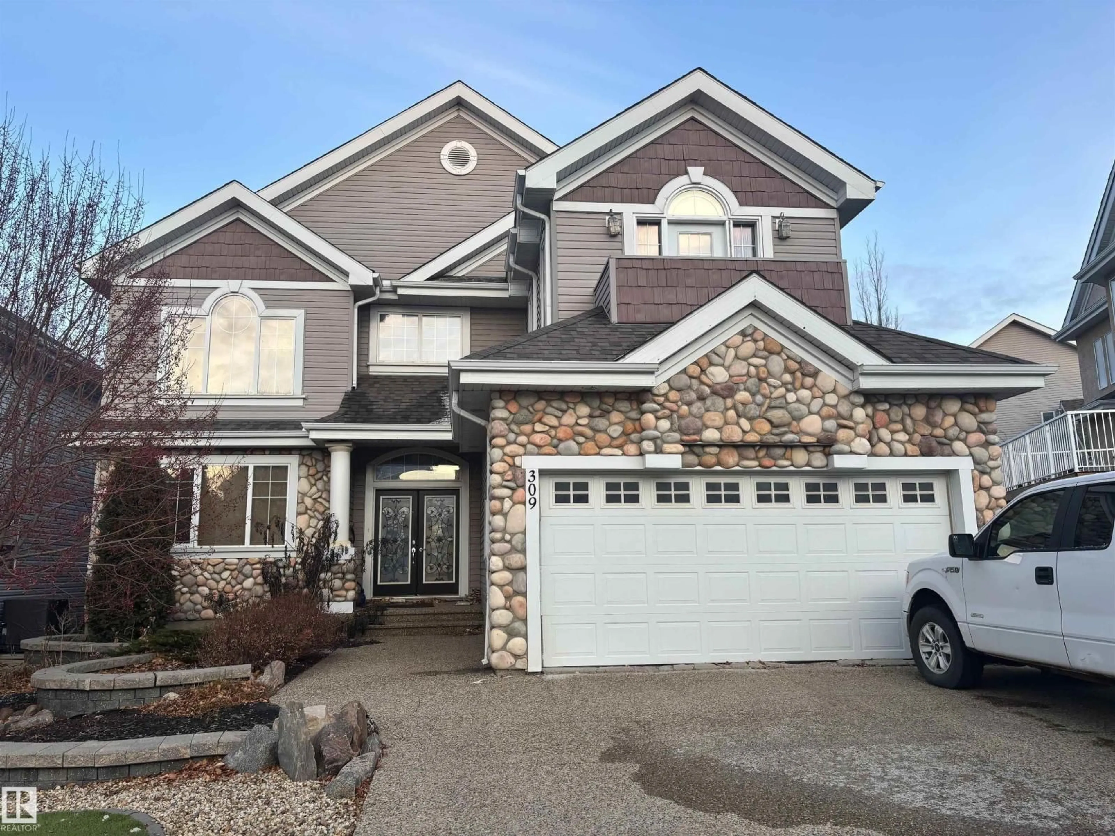 Home with brick exterior material, street for 309 SUMMERSIDE COVE CV, Edmonton Alberta T6X1B4