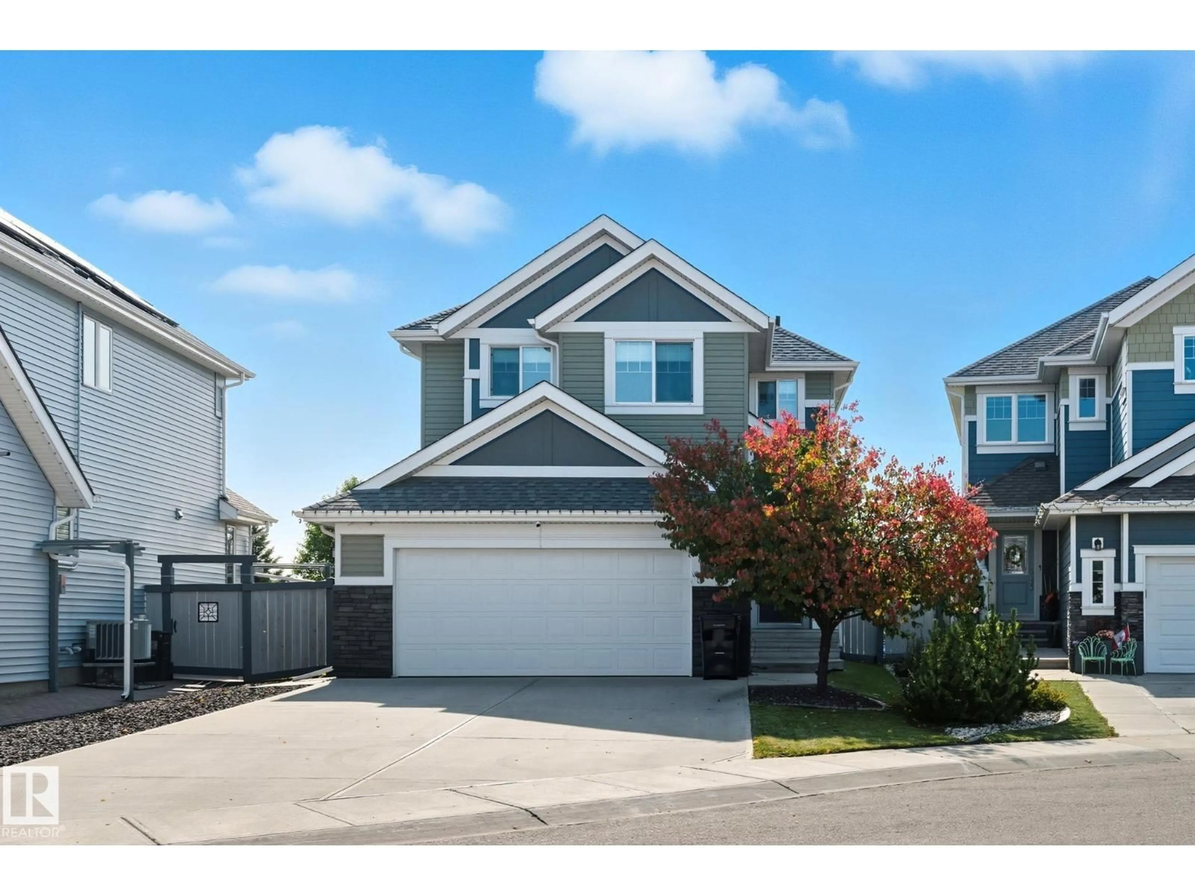 Home with vinyl exterior material, street for 8039 18 AV, Edmonton Alberta T6X0Z8