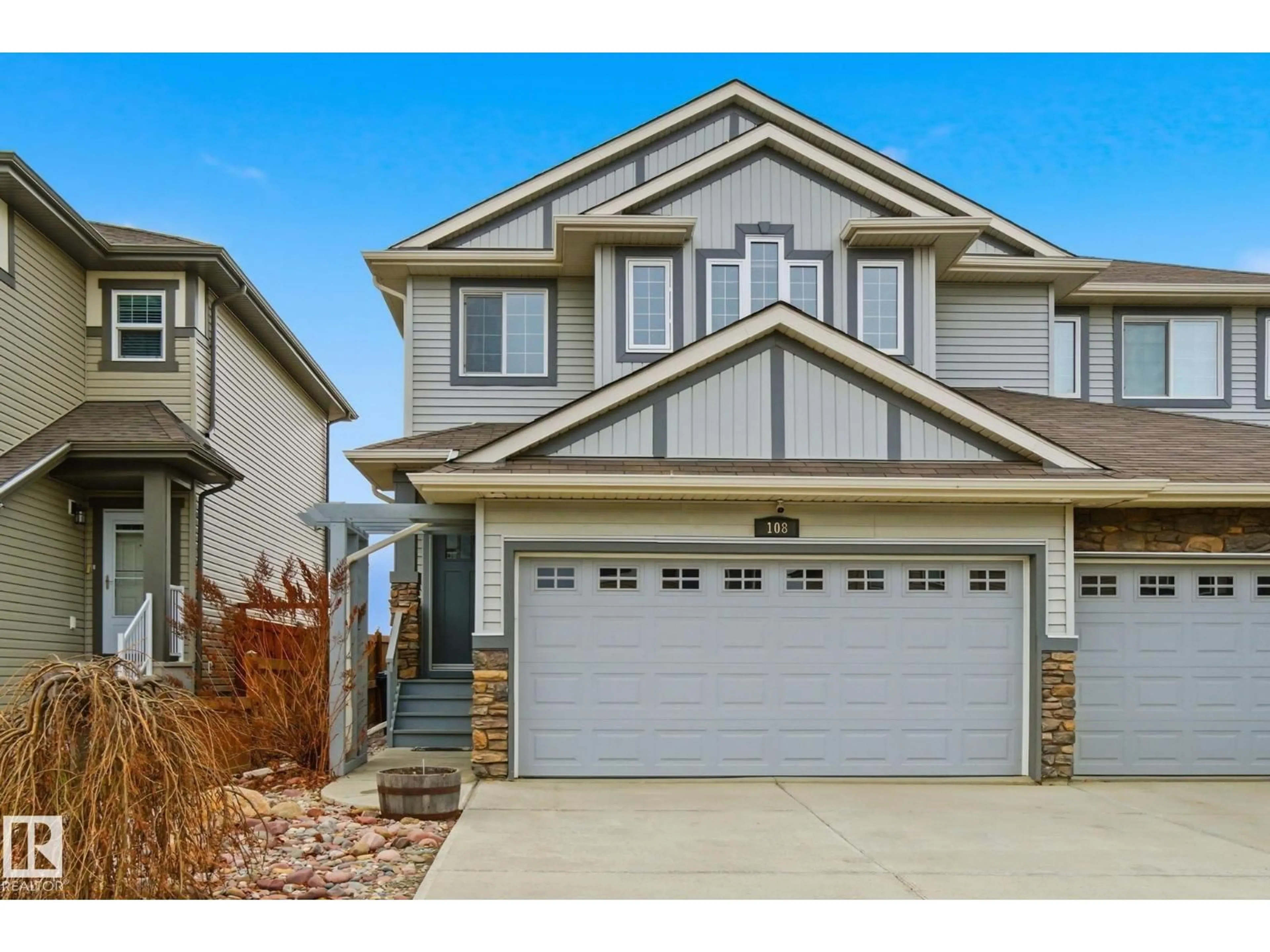 Home with vinyl exterior material, street for 108 SOUTH CREEK WD, Stony Plain Alberta T7Z0J9