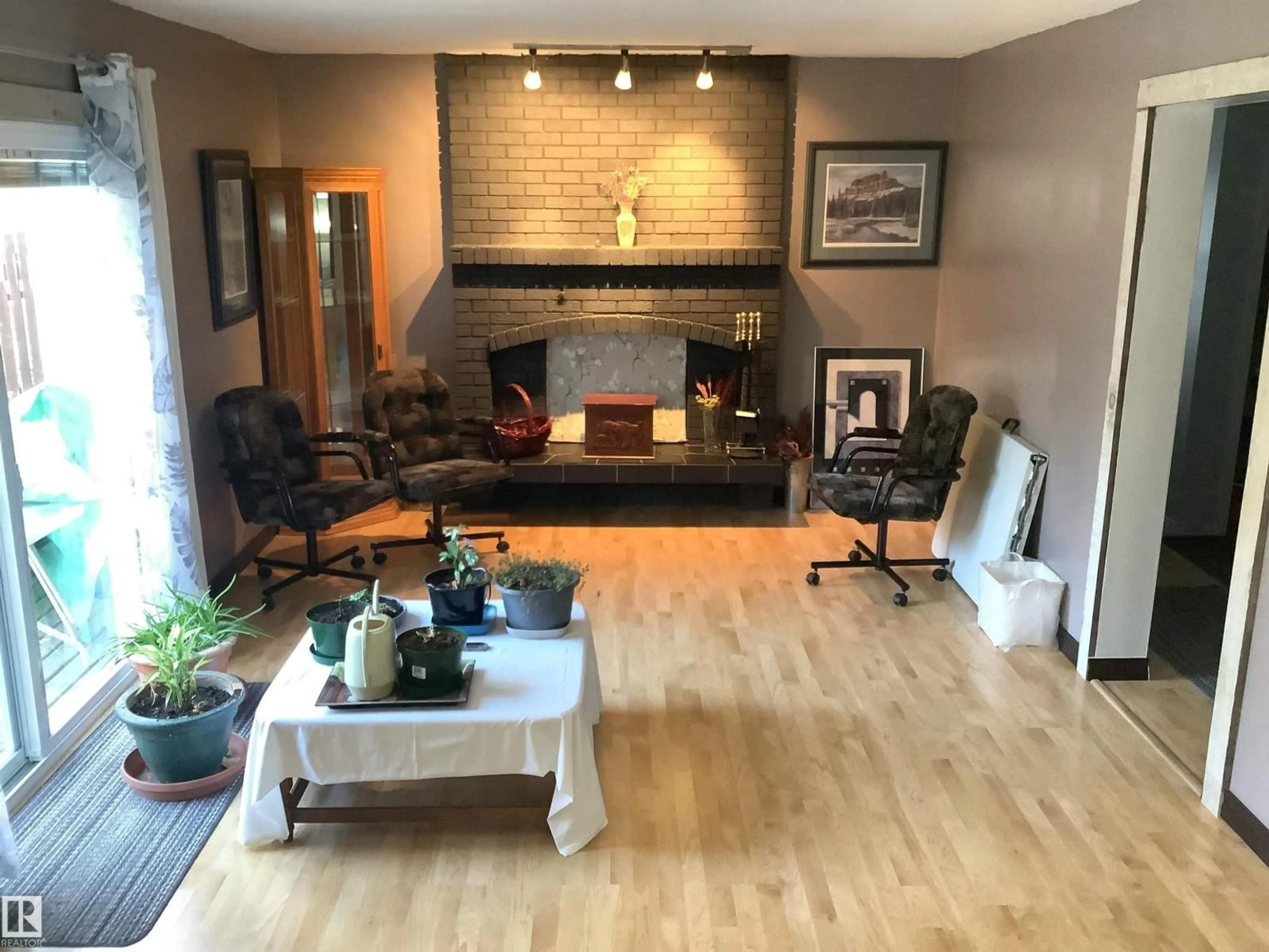 Living room with furniture, wood/laminate floor for 29 WHEATSTONE CR, St. Albert Alberta T8N3T9