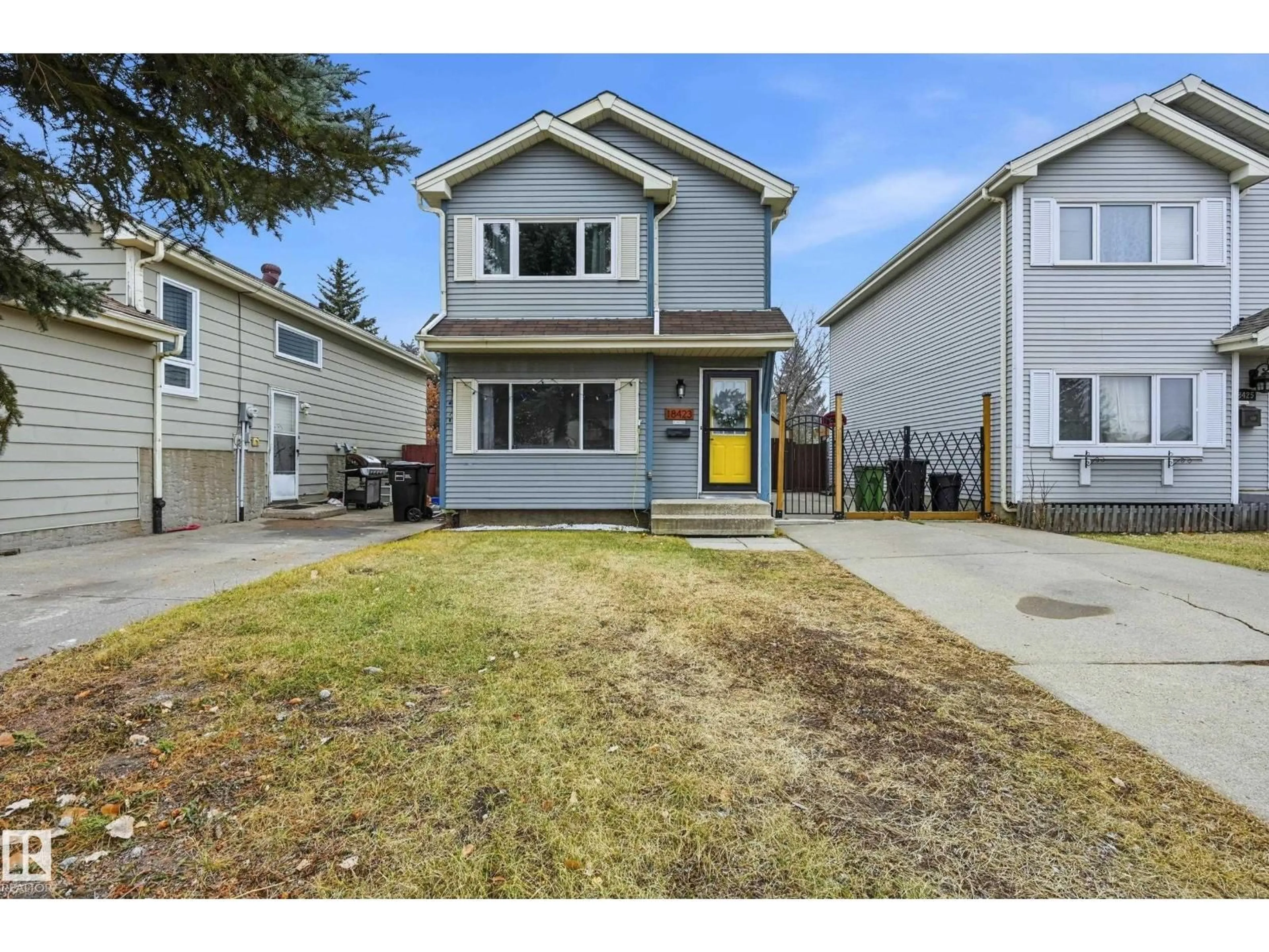 Home with vinyl exterior material, street for 18423 95A AV, Edmonton Alberta T5T3V7