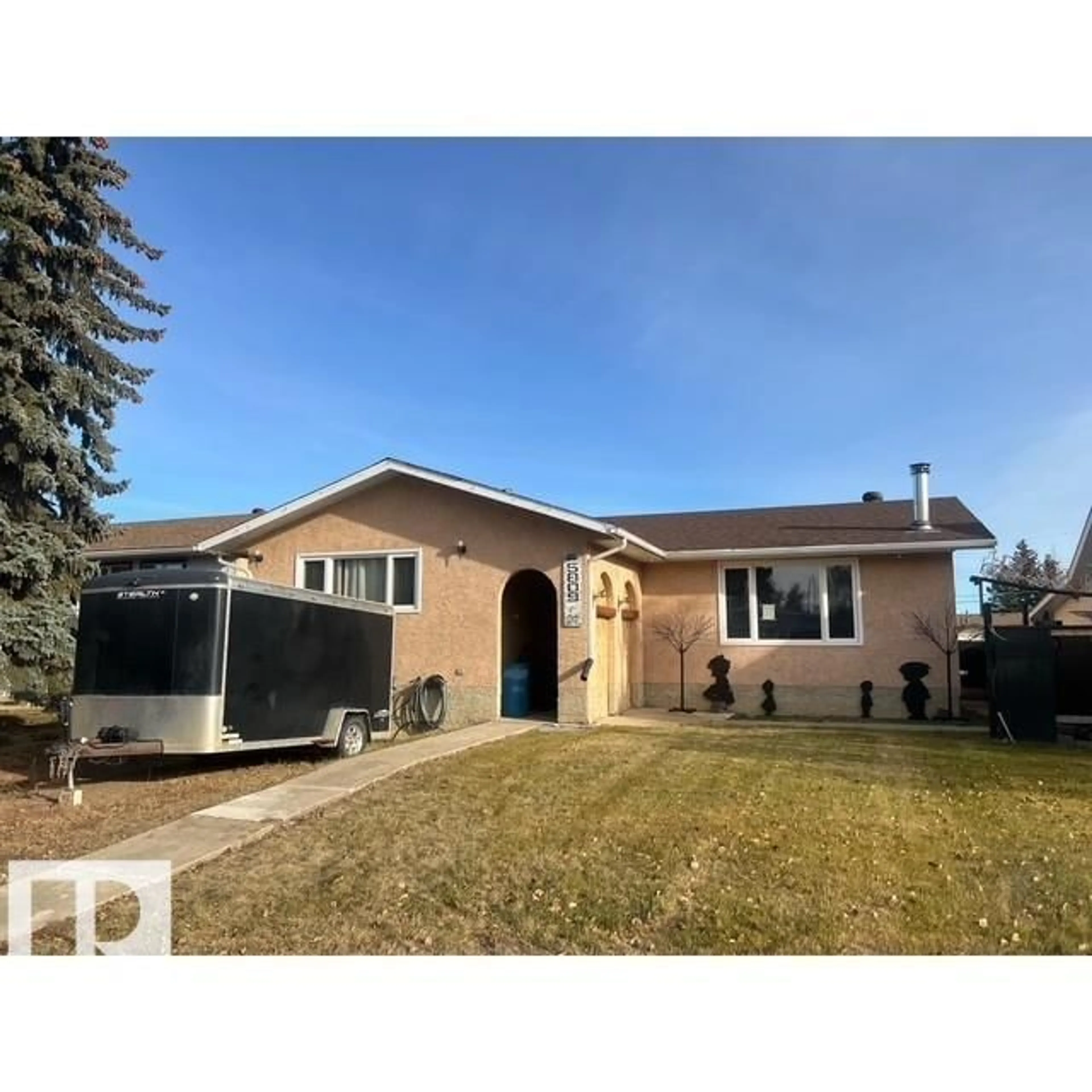 Home with vinyl exterior material, street for 5809 55 ST, Vegreville Alberta T9C1J6