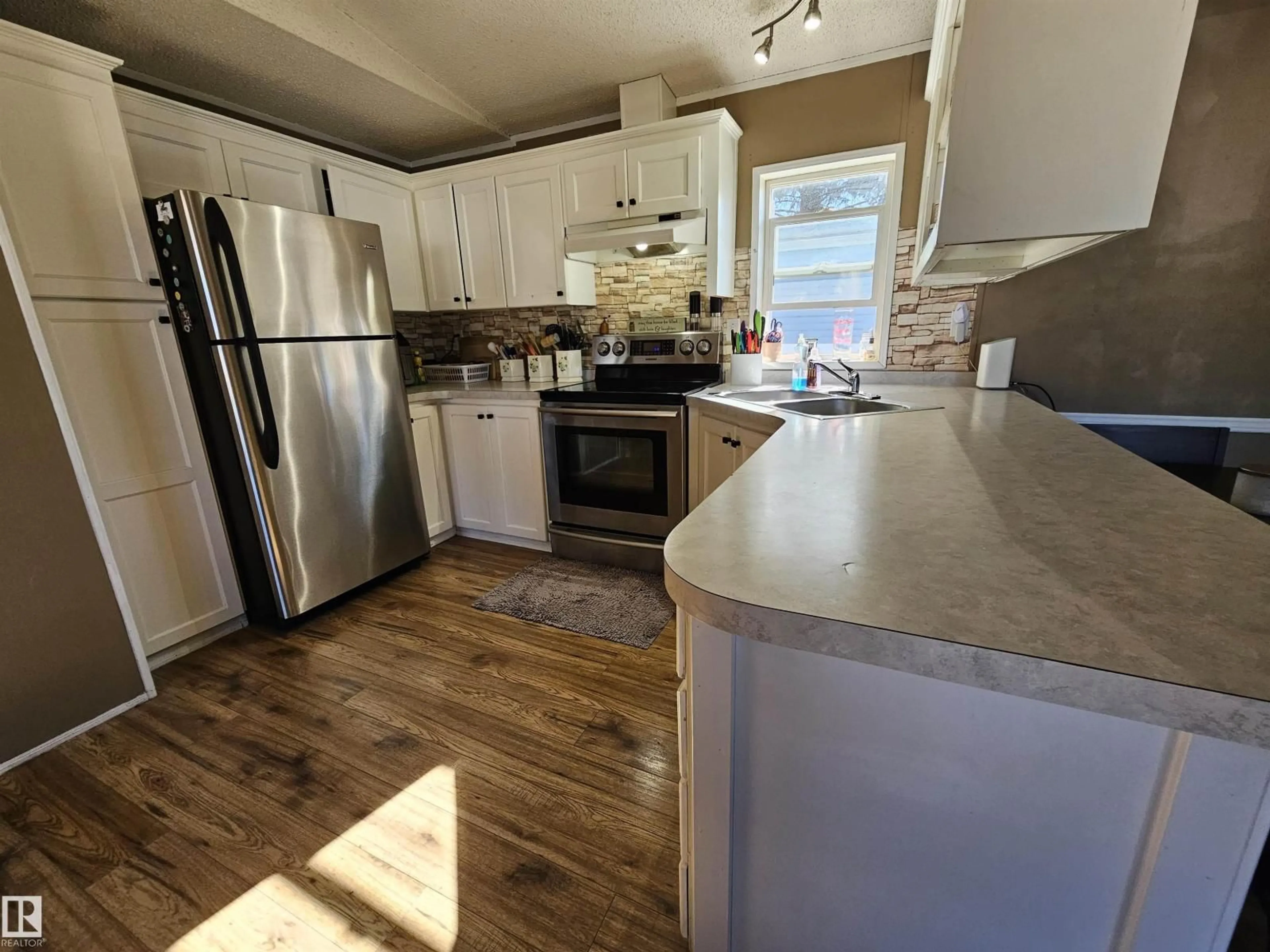 Open concept kitchen, unknown for 305 - 84 CALAHOO RD, Spruce Grove Alberta T7X3K7