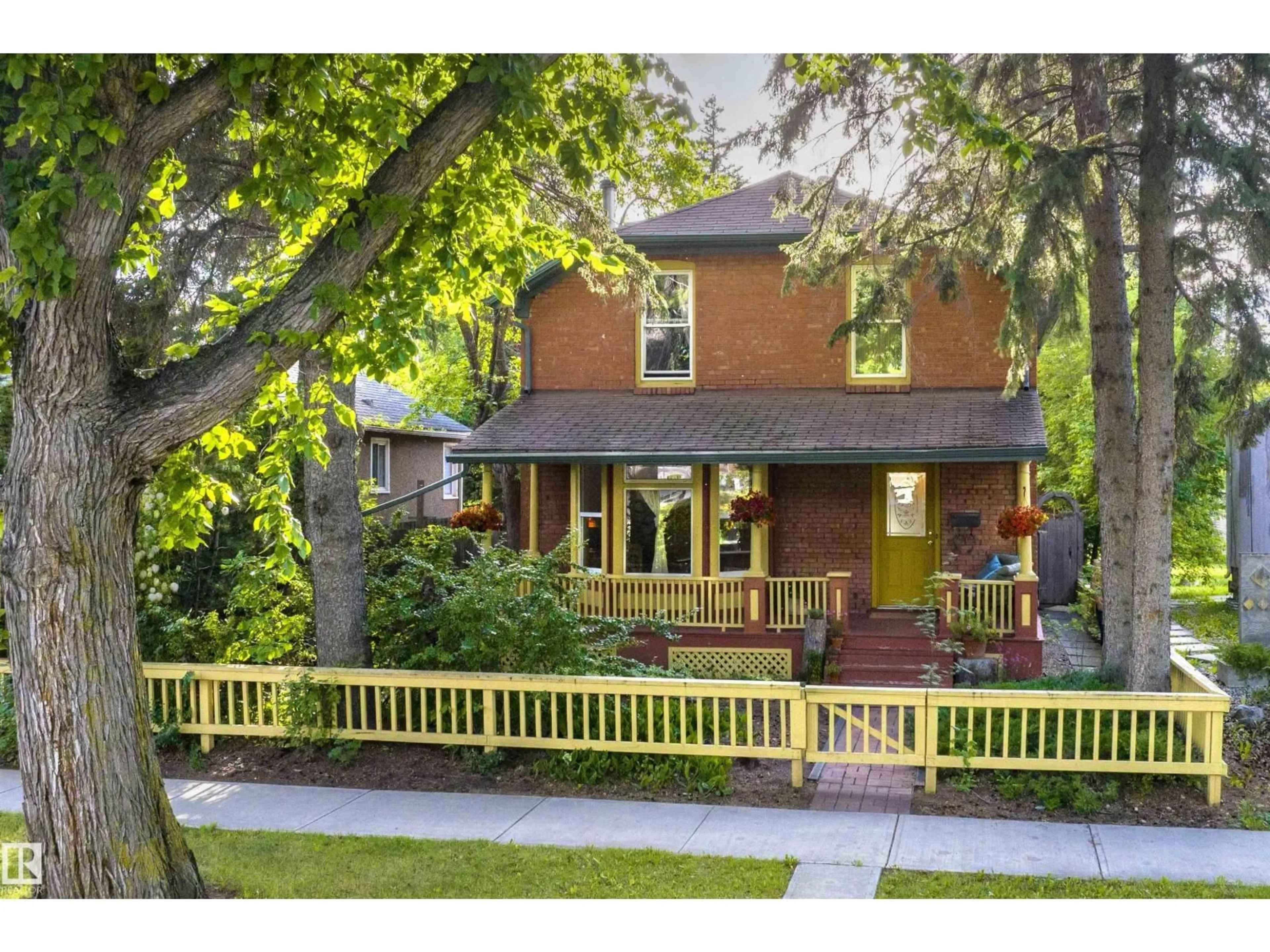 Home with brick exterior material, street for NW - 7024 105A ST, Edmonton Alberta T6H2R5