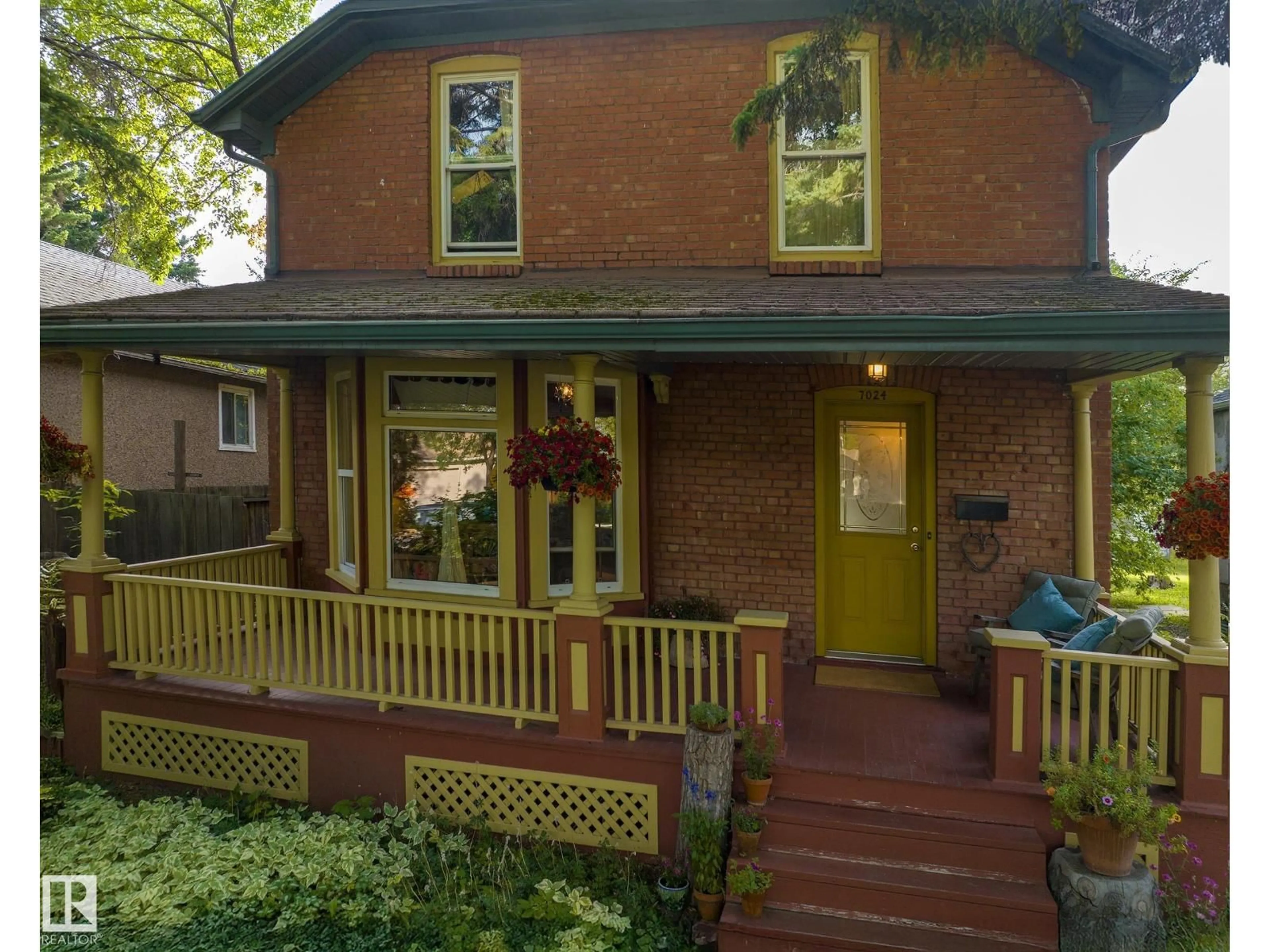 Home with brick exterior material, street for NW - 7024 105A ST, Edmonton Alberta T6H2R5