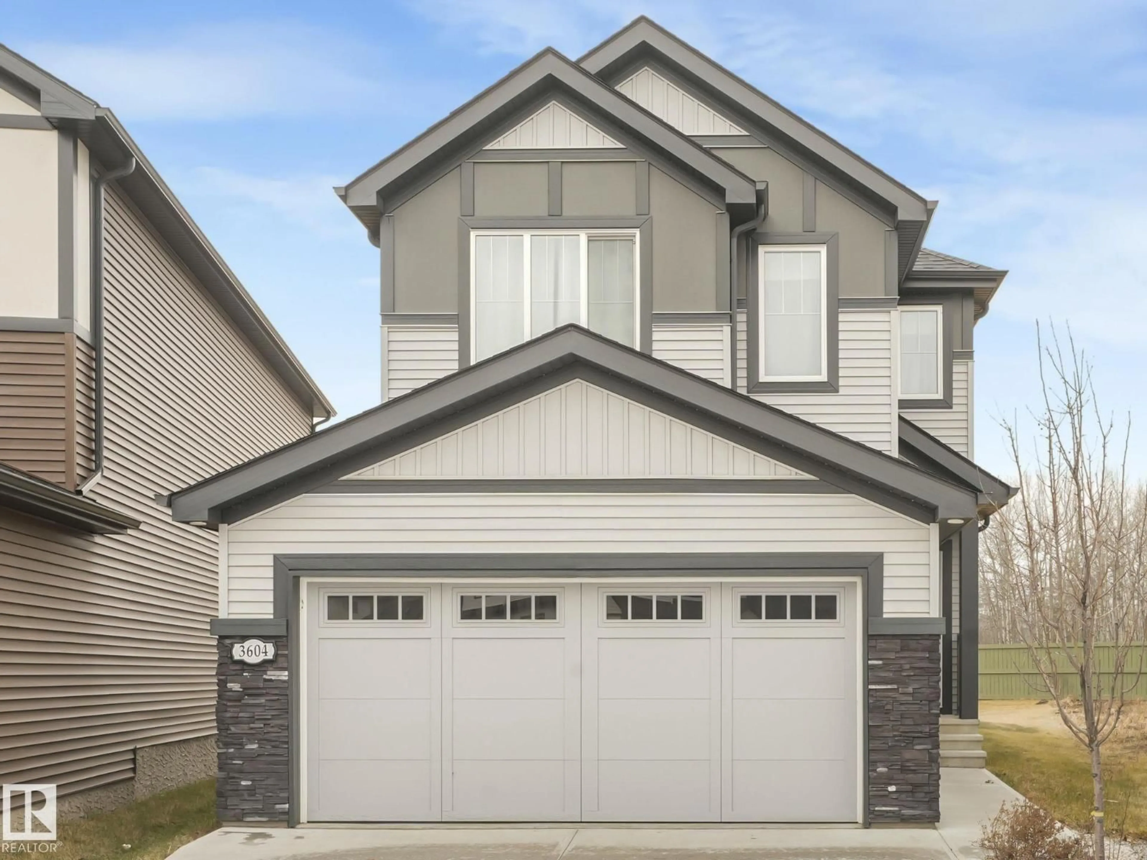 Home with vinyl exterior material, street for NW - 3604 214 ST, Edmonton Alberta T6M1S3