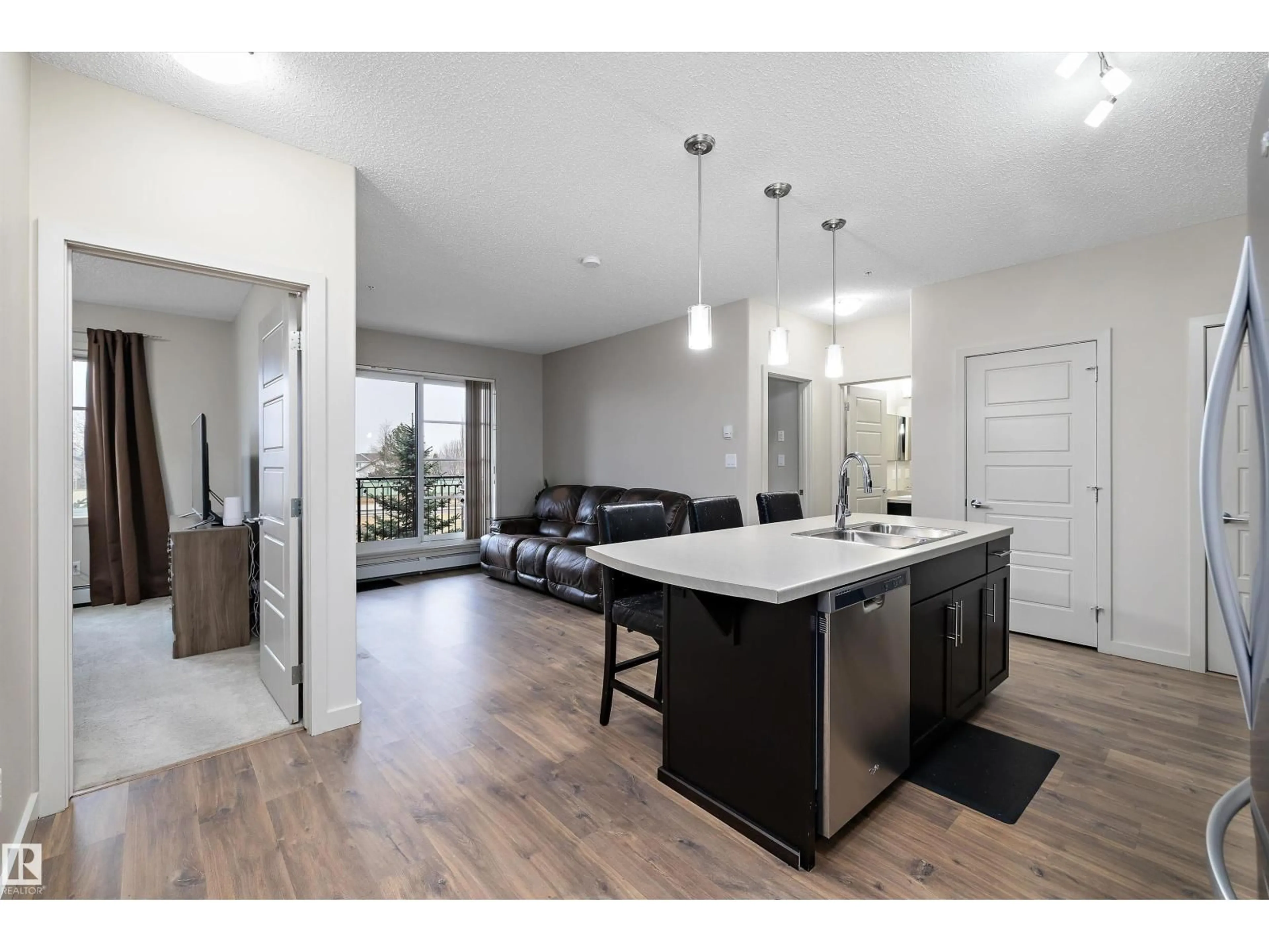 Open concept kitchen, unknown for #214 - 1004 ROSENTHAL BV, Edmonton Alberta T5T7C6