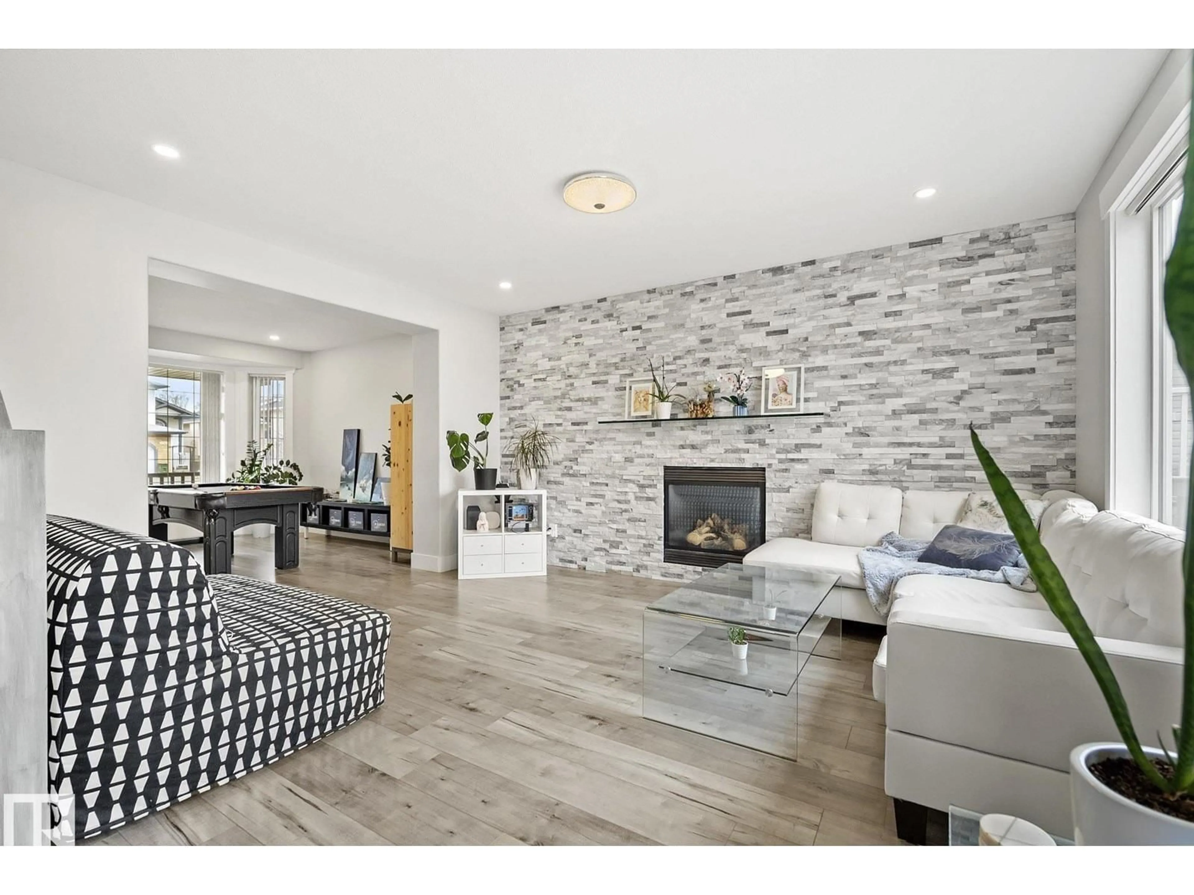 Living room with furniture, unknown for 4748 154 AV, Edmonton Alberta T5Y0C2